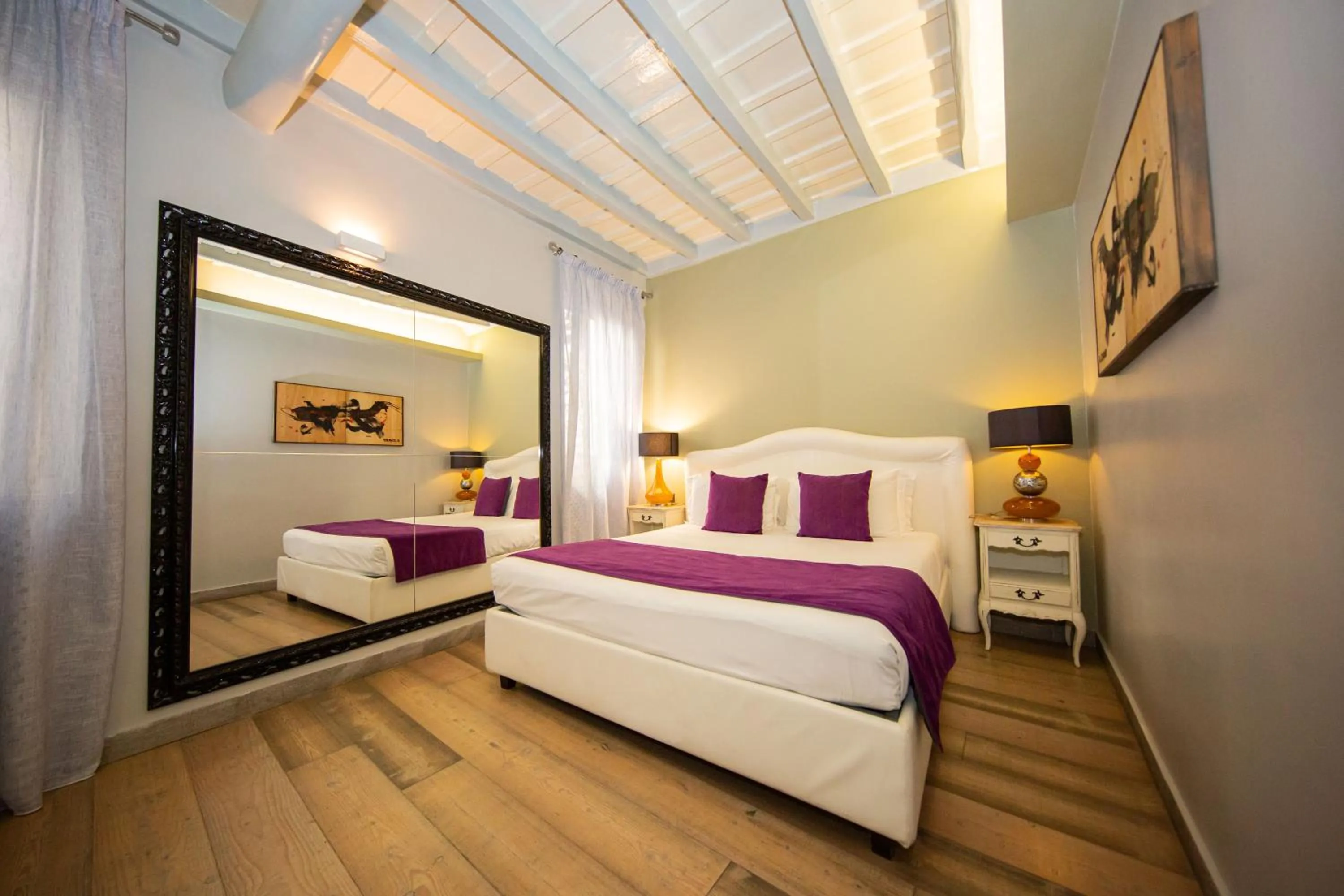 Bed in Corso Suite 107 Rooms Wellness & Spa