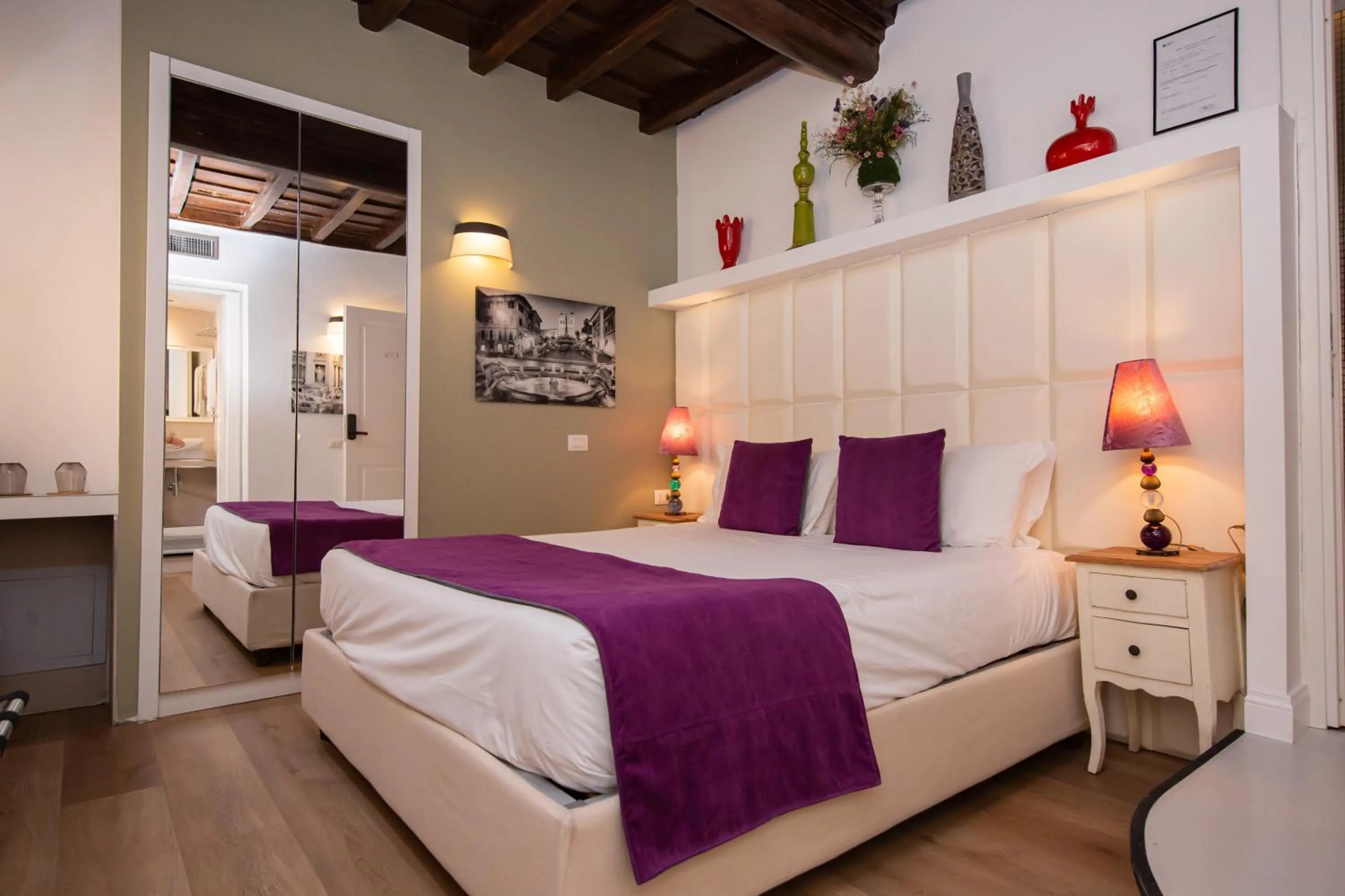 Bed in Corso Suite 107 Rooms Wellness & Spa