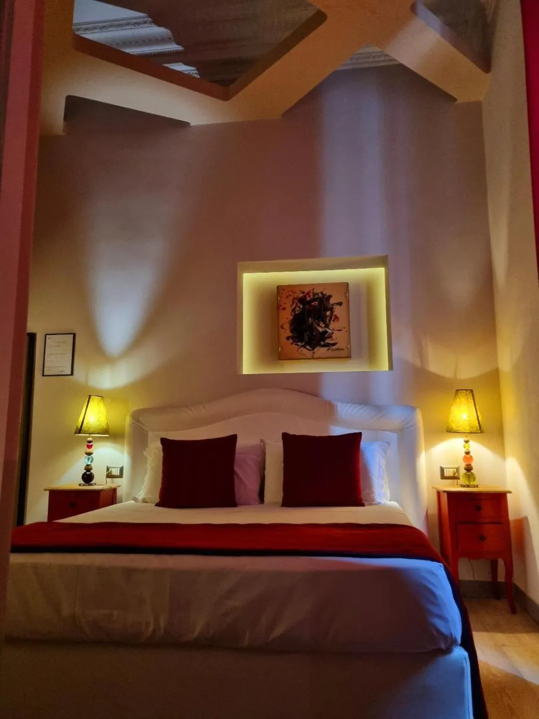 Decorative detail, Bed in Corso Suite 107 Rooms Wellness & Spa