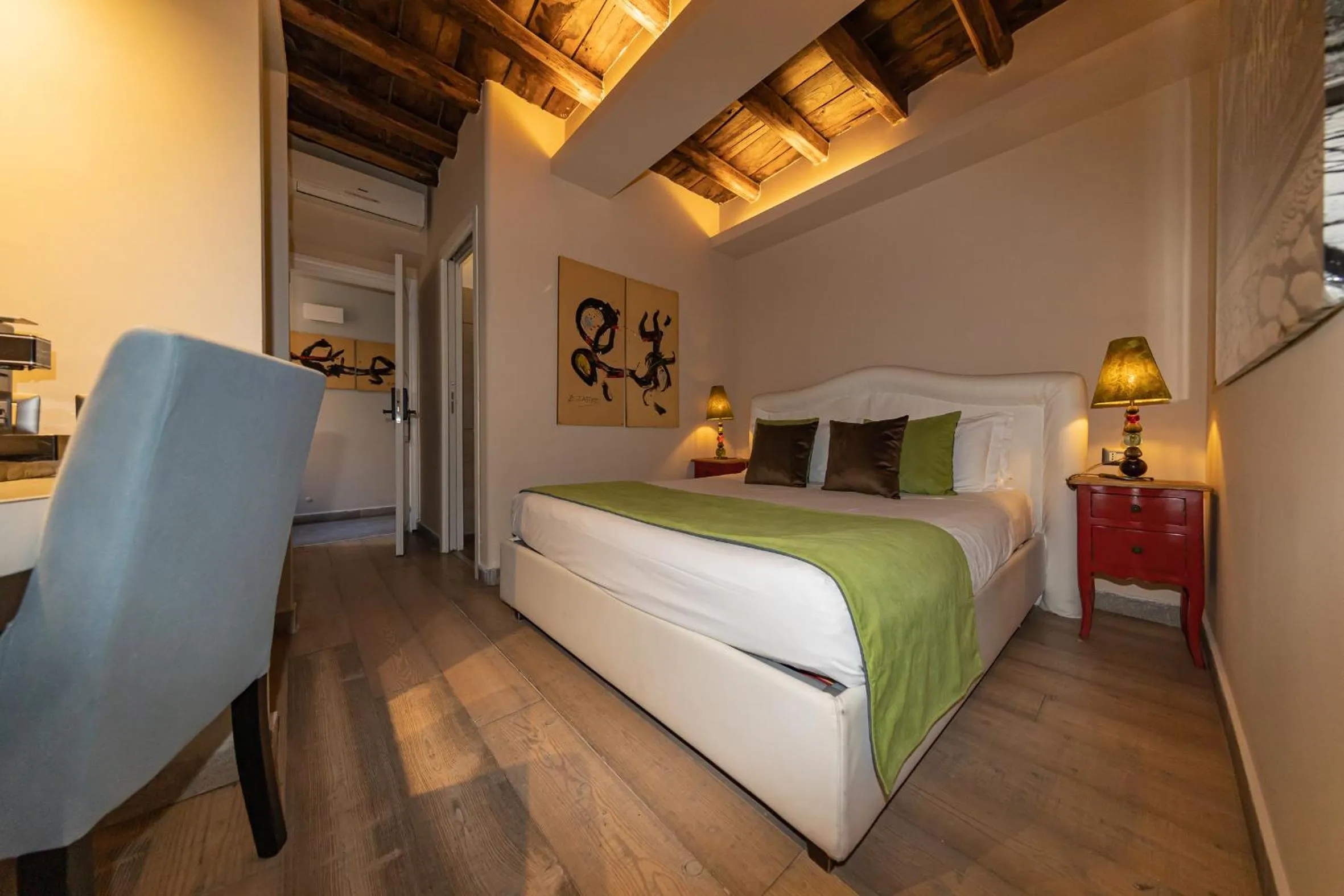 Bed in Corso Suite 107 Rooms Wellness & Spa