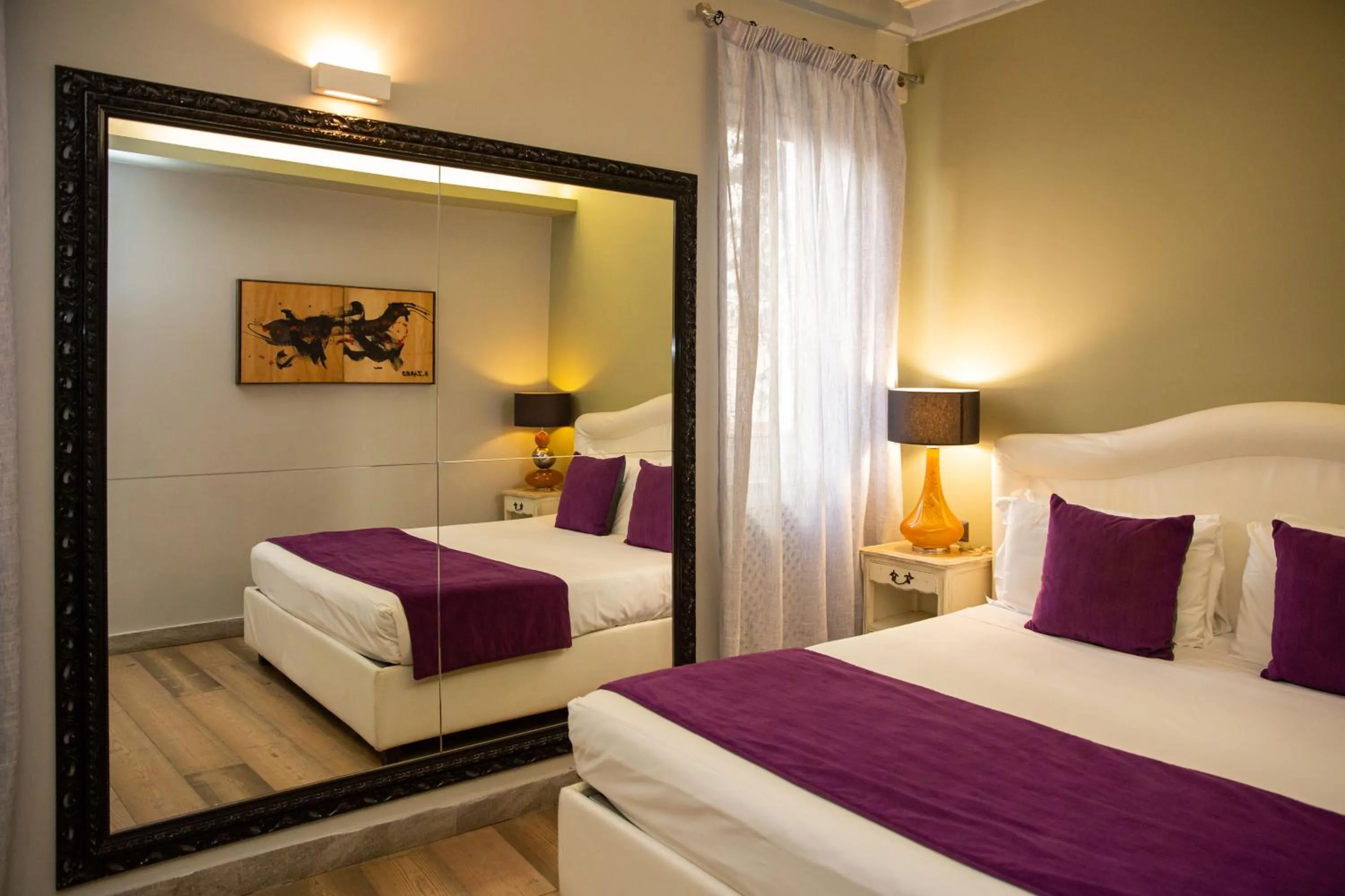 Bed in Corso Suite 107 Rooms Wellness & Spa