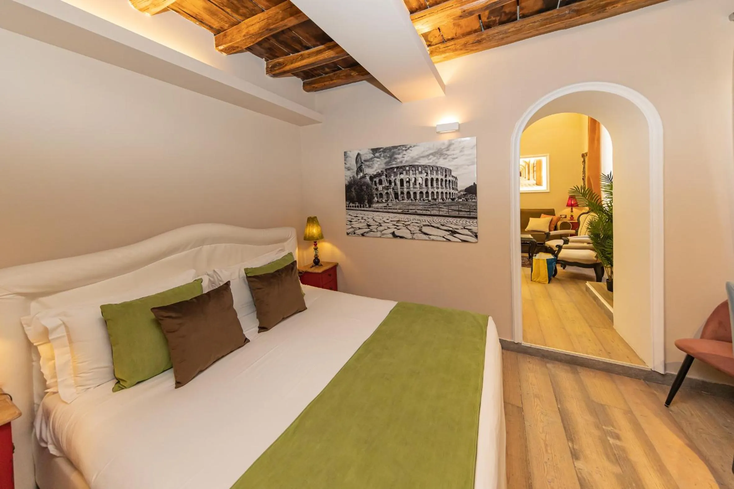 Bed in Corso Suite 107 Rooms Wellness & Spa