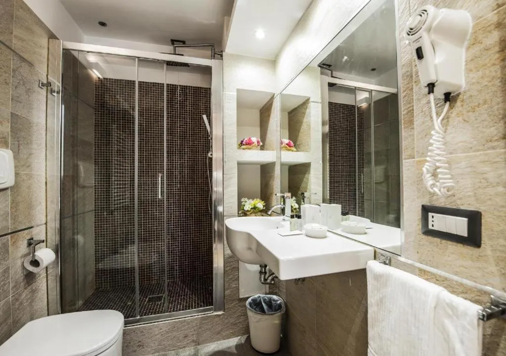 Bathroom in Corso Suite 107 Rooms Wellness & Spa