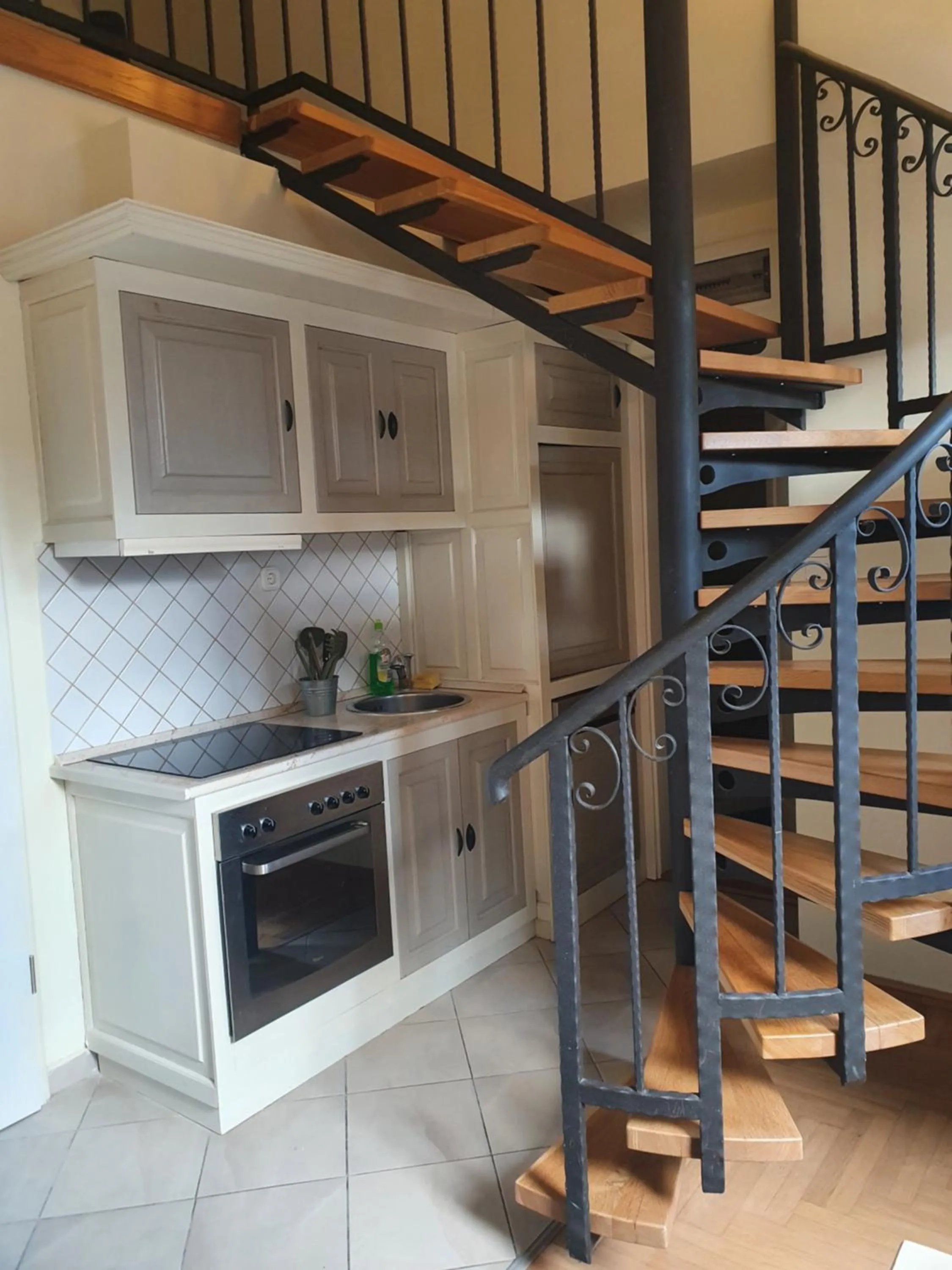 Kitchen or kitchenette in Pater Apartments and Rooms