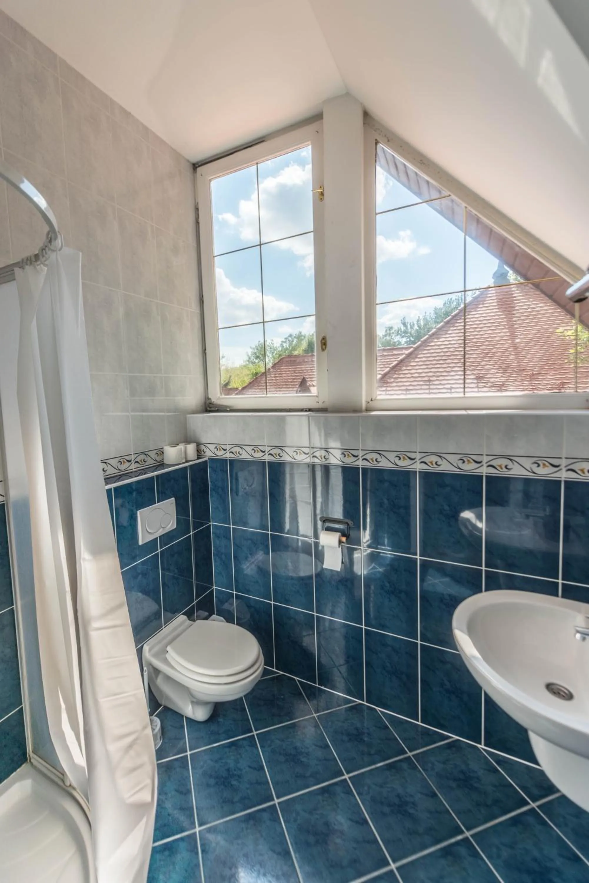 Bathroom in Pater Apartments and Rooms