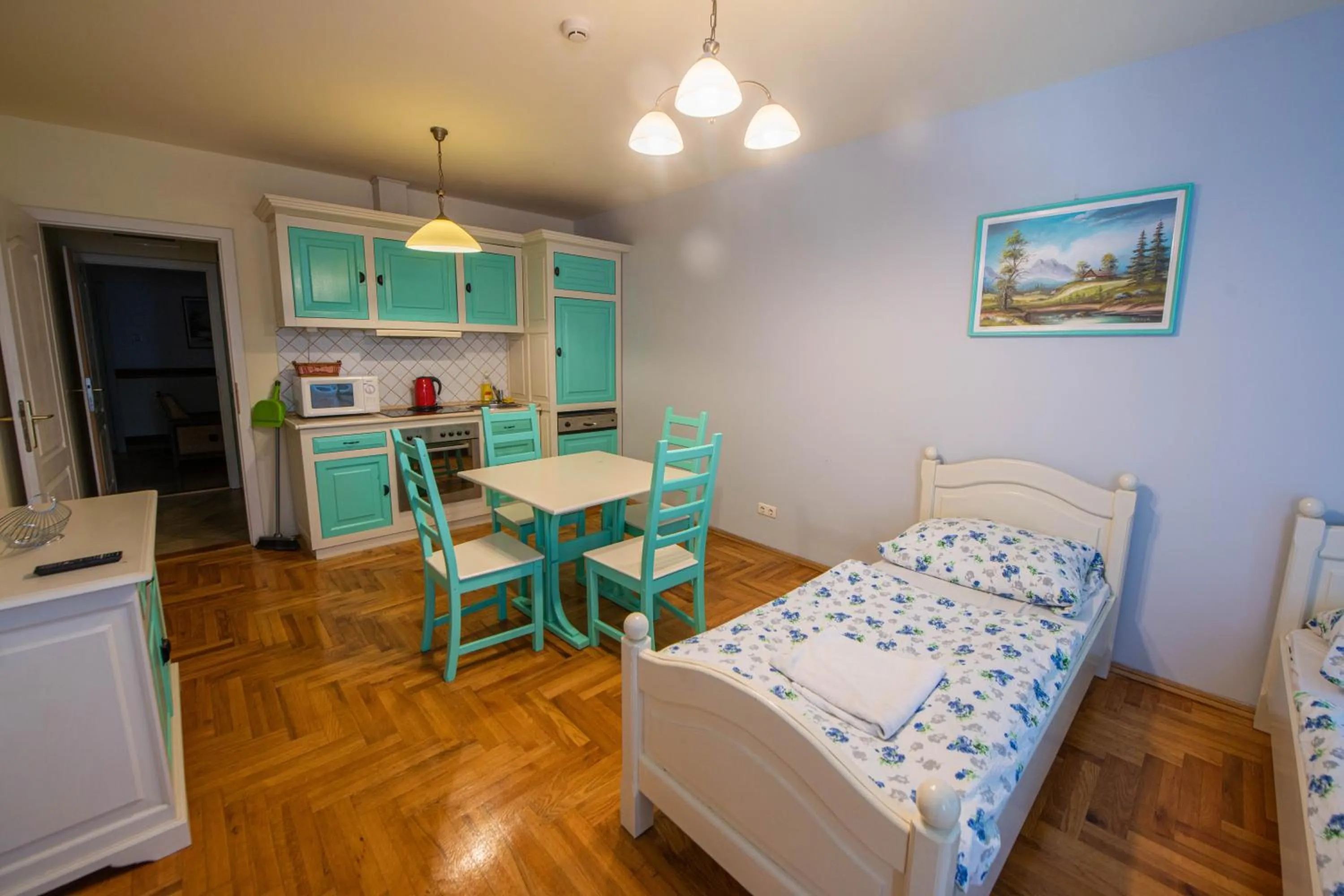 Kitchen or kitchenette, Bed in Pater Apartments and Rooms