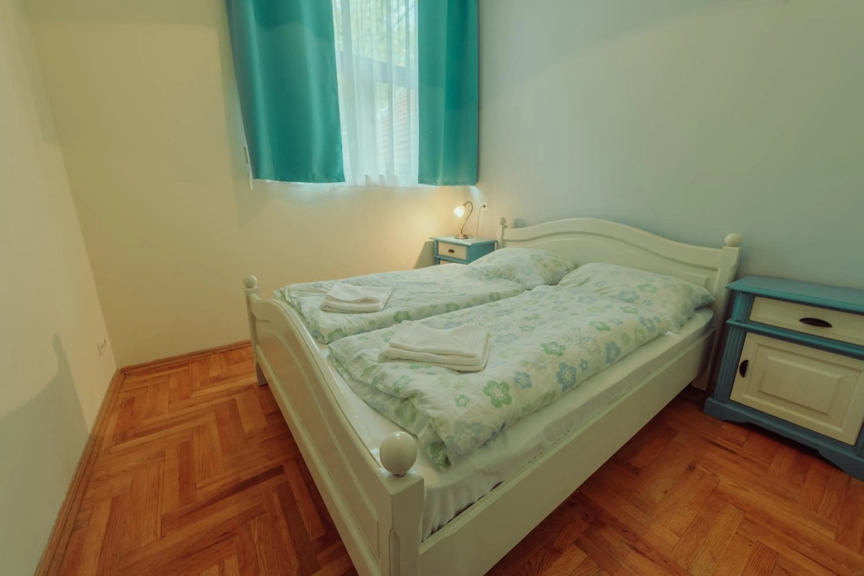 Bed in Pater Apartments and Rooms
