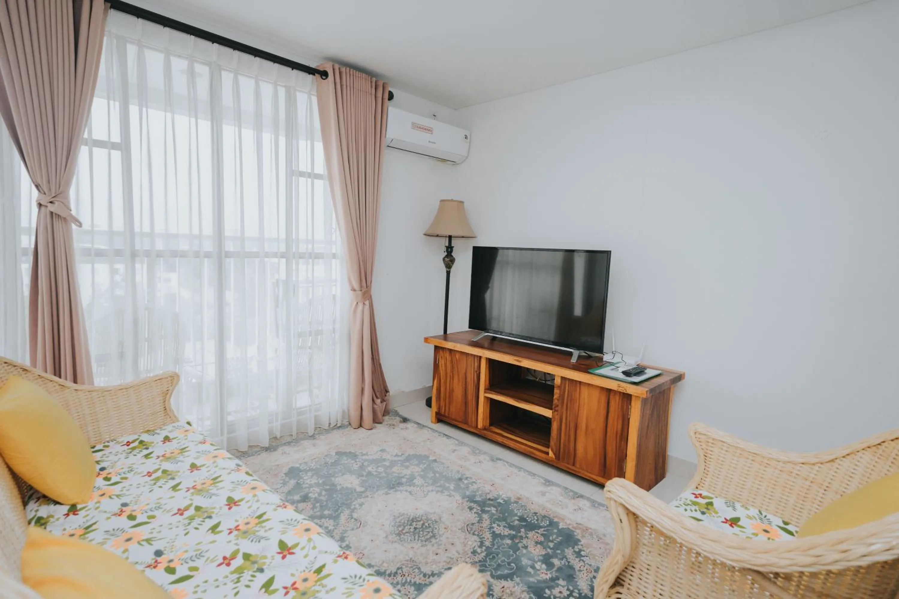 Living room, Bed in Apartemen Tera Residence
