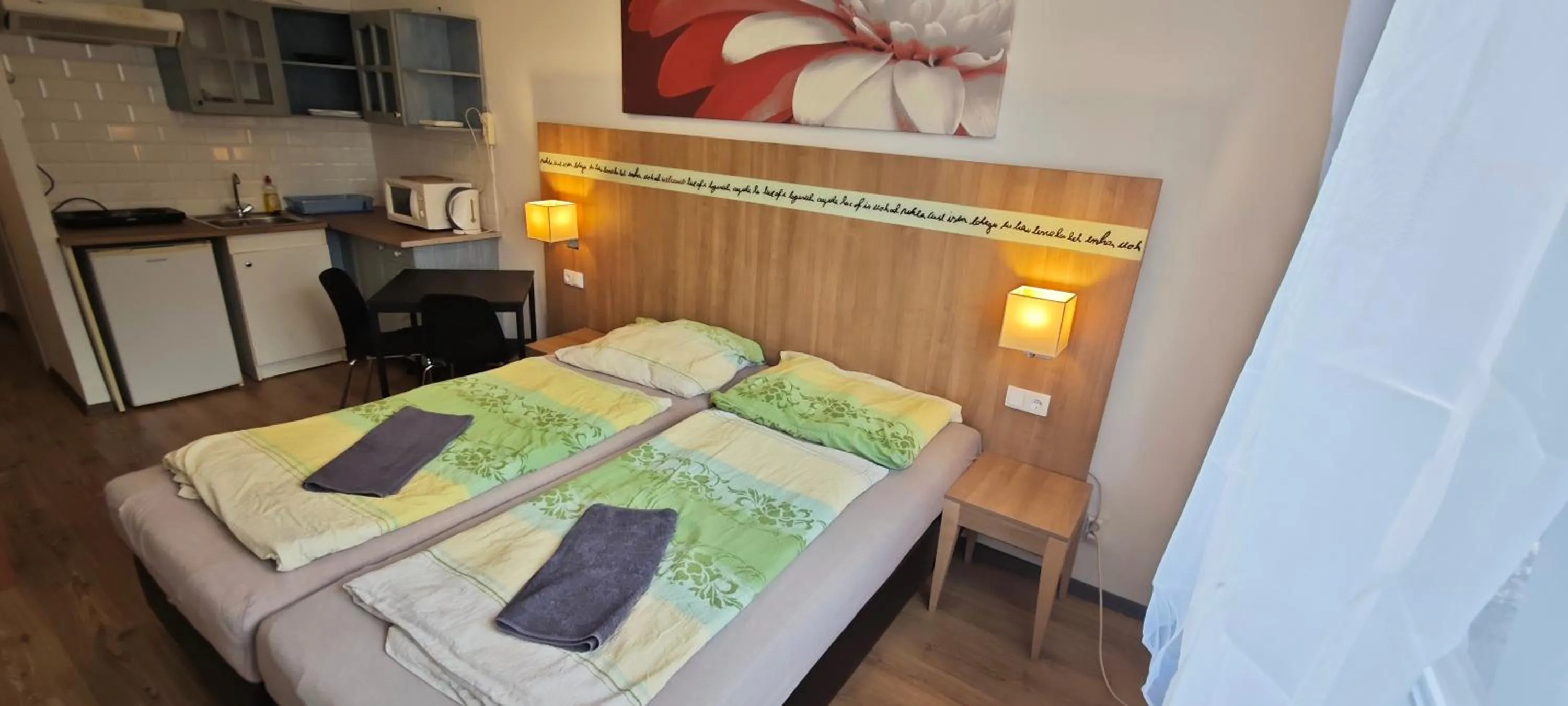 Bed in Apartments Leslie