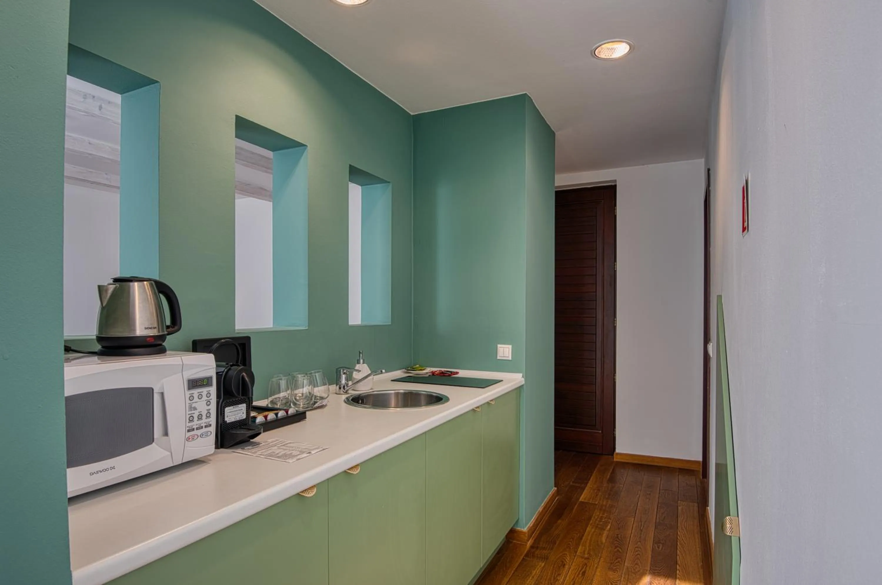 Kitchen or kitchenette in Tisza Balneum Hotel