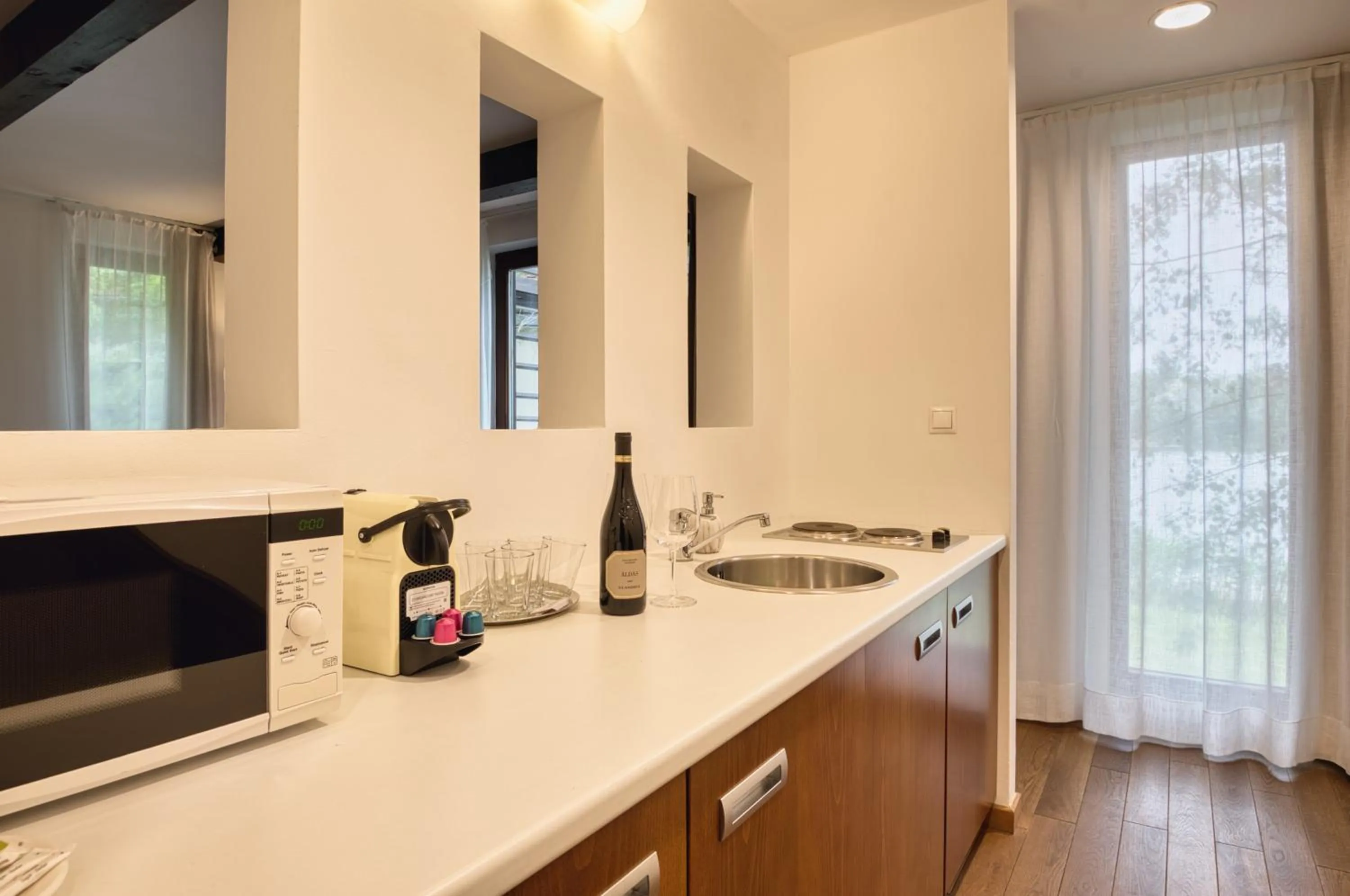Kitchen or kitchenette in Tisza Balneum Hotel