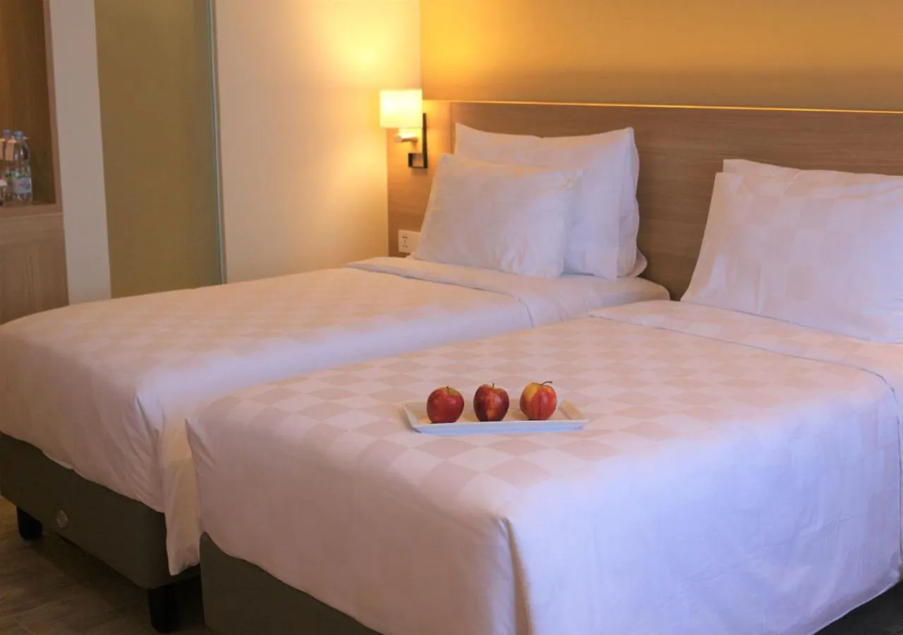 Bathroom, Bed in Swiss-Belhotel Cendrawasih, Biak