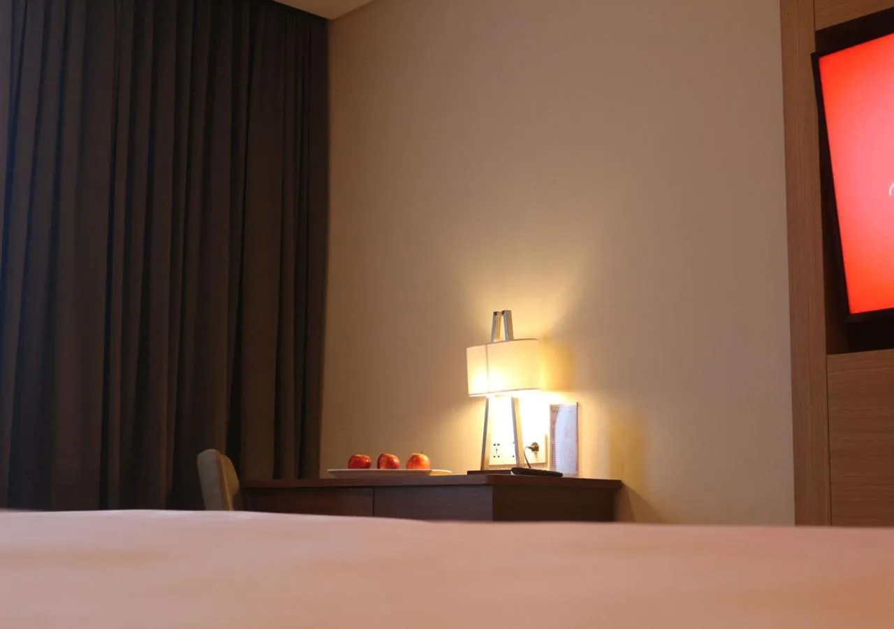 Bathroom, Bed in Swiss-Belhotel Cendrawasih, Biak