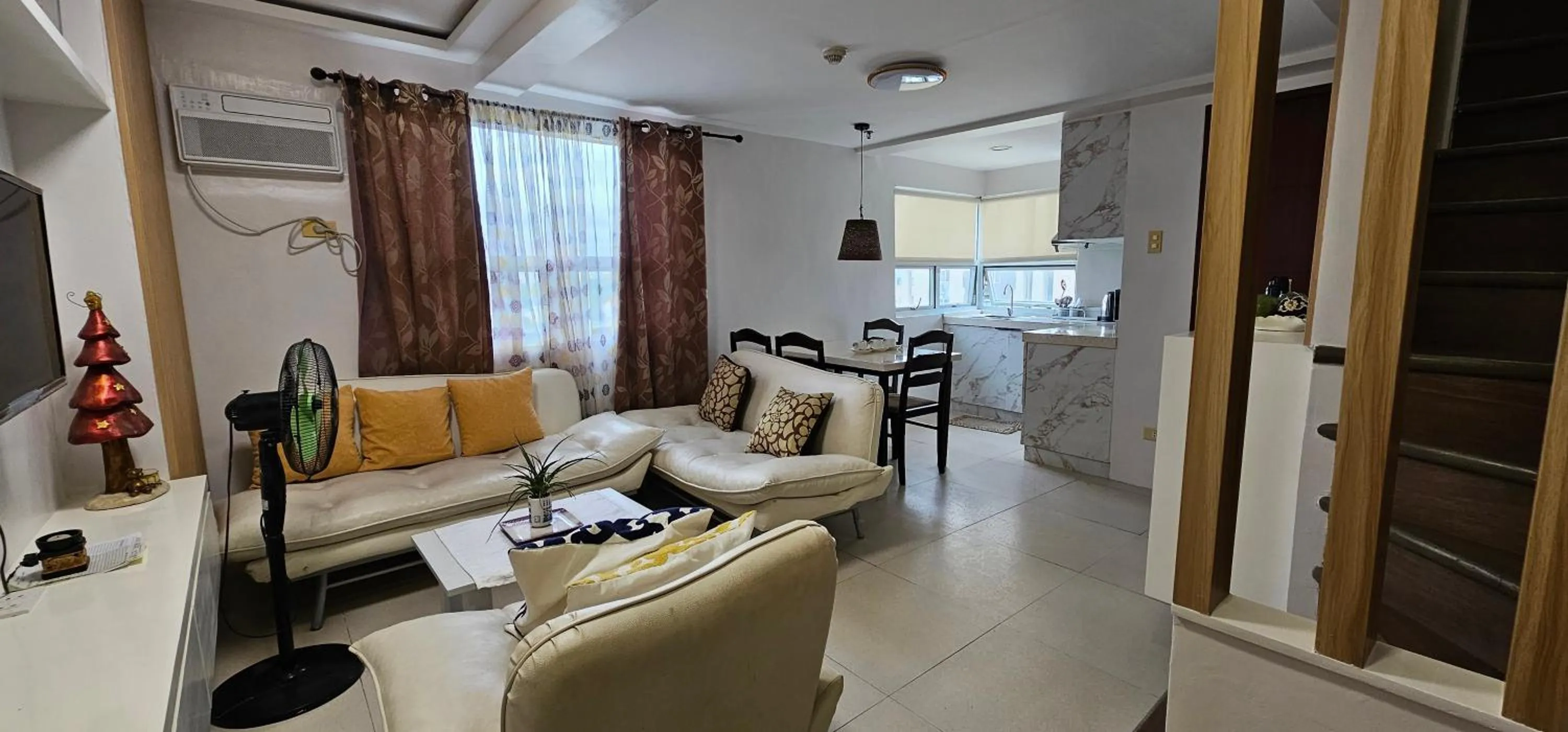 Living room in Gilmore Tower Suites By SMS Hospitality