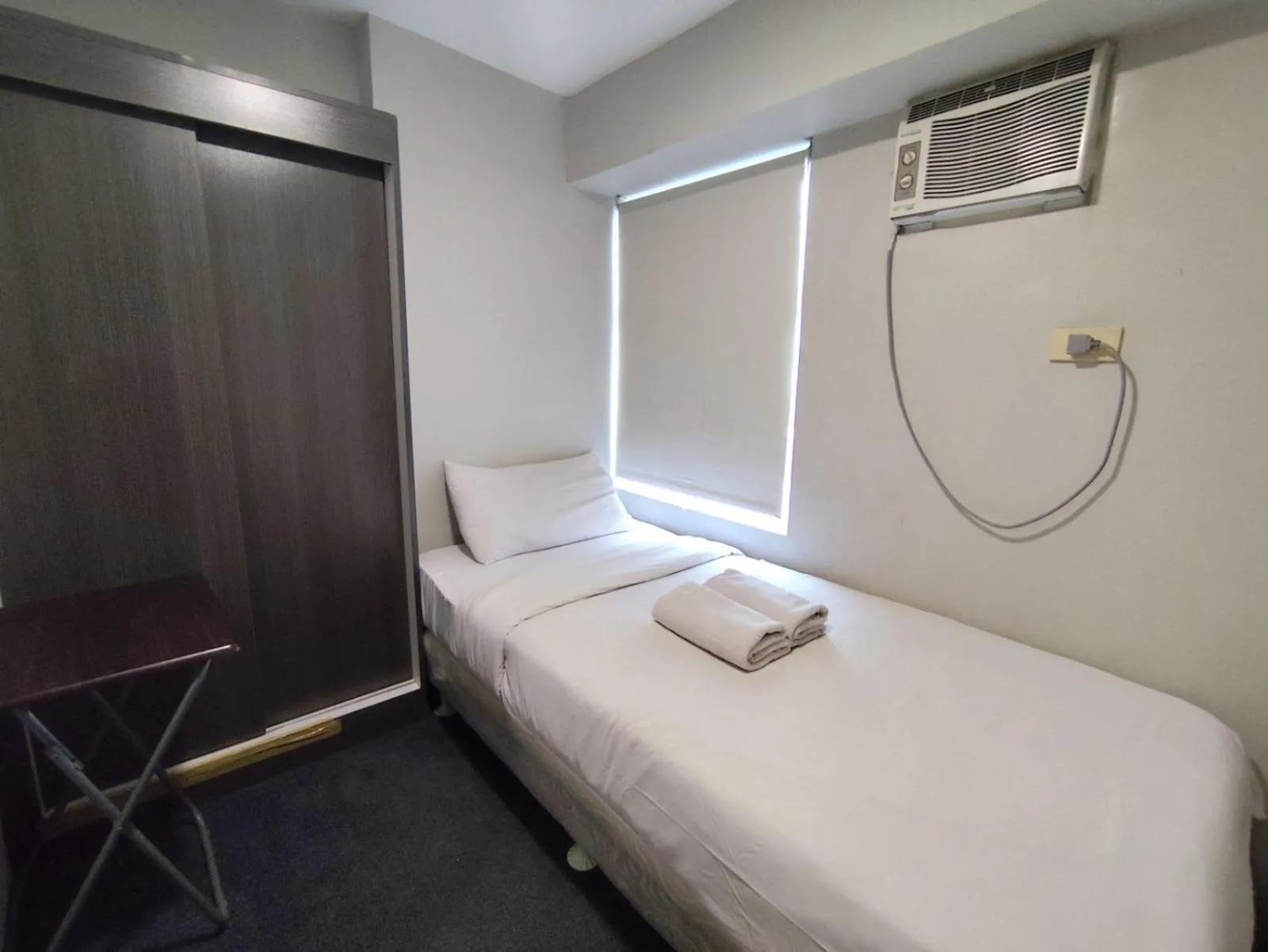 Bedroom, Bed in Gilmore Tower Suites By SMS Hospitality