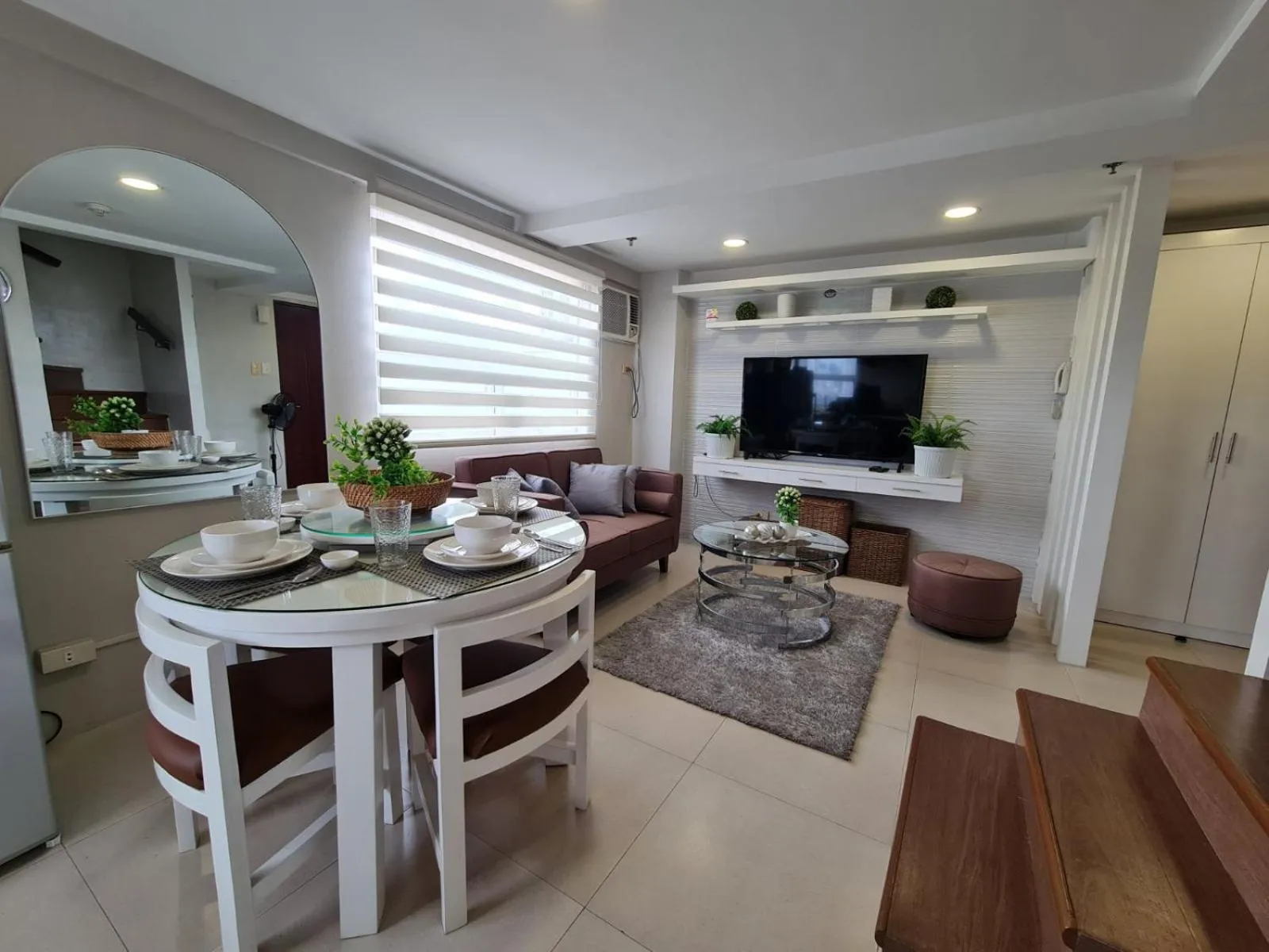 Dining area in Gilmore Tower Suites By SMS Hospitality