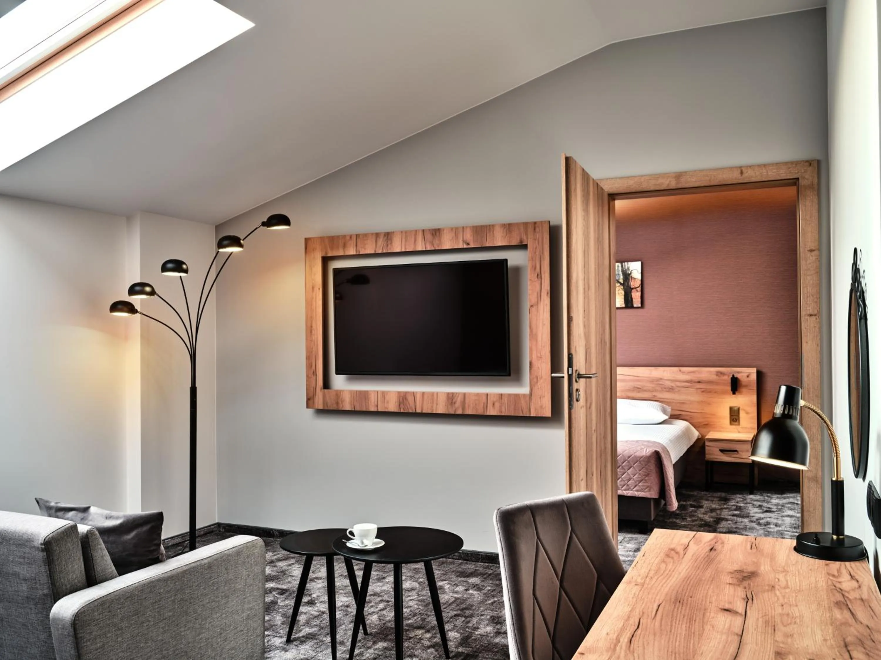 Communal lounge/ TV room in 1891 Garni Hotel