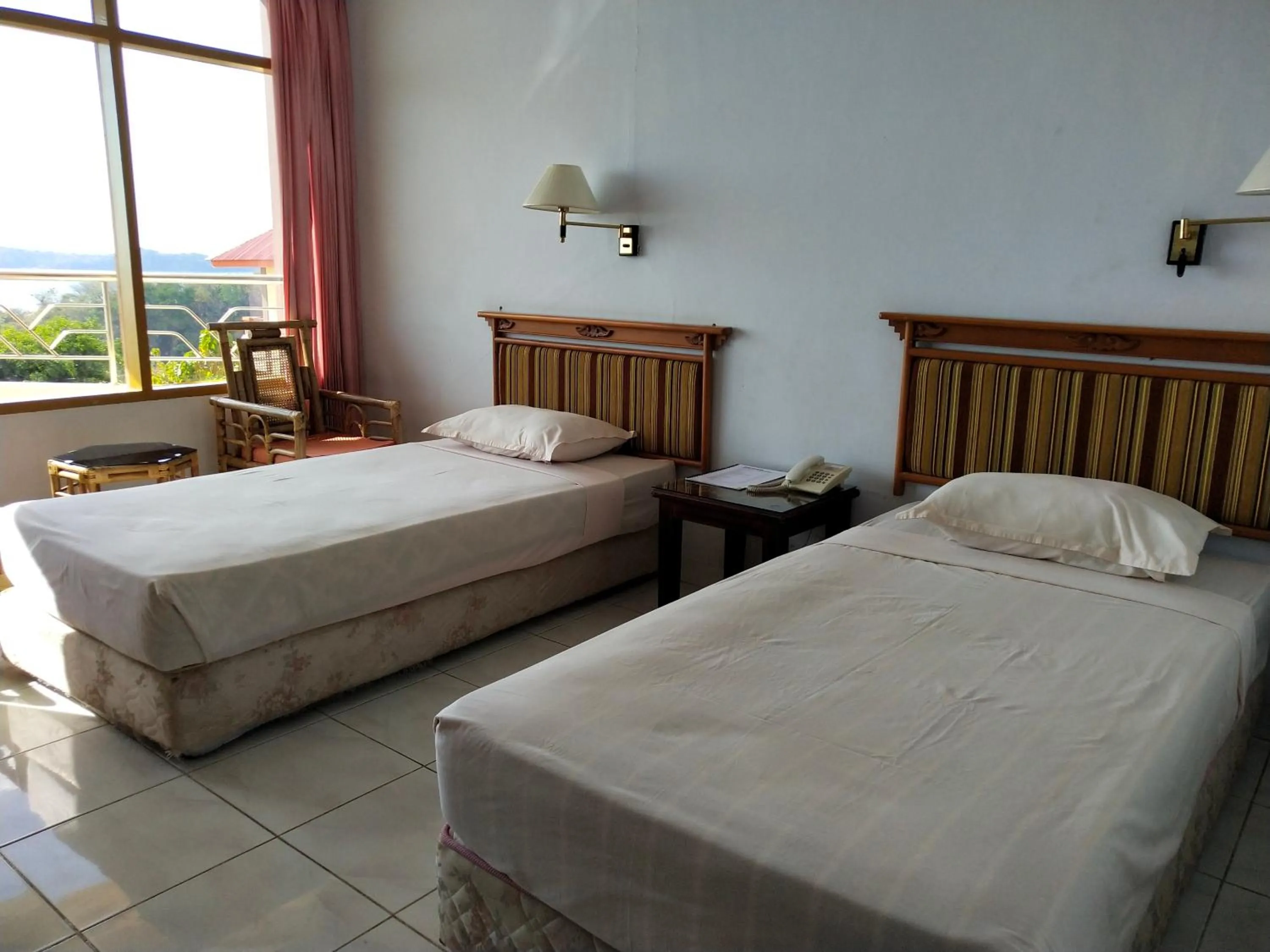 Bed in Bukit Kenari Hotel & Restaurant