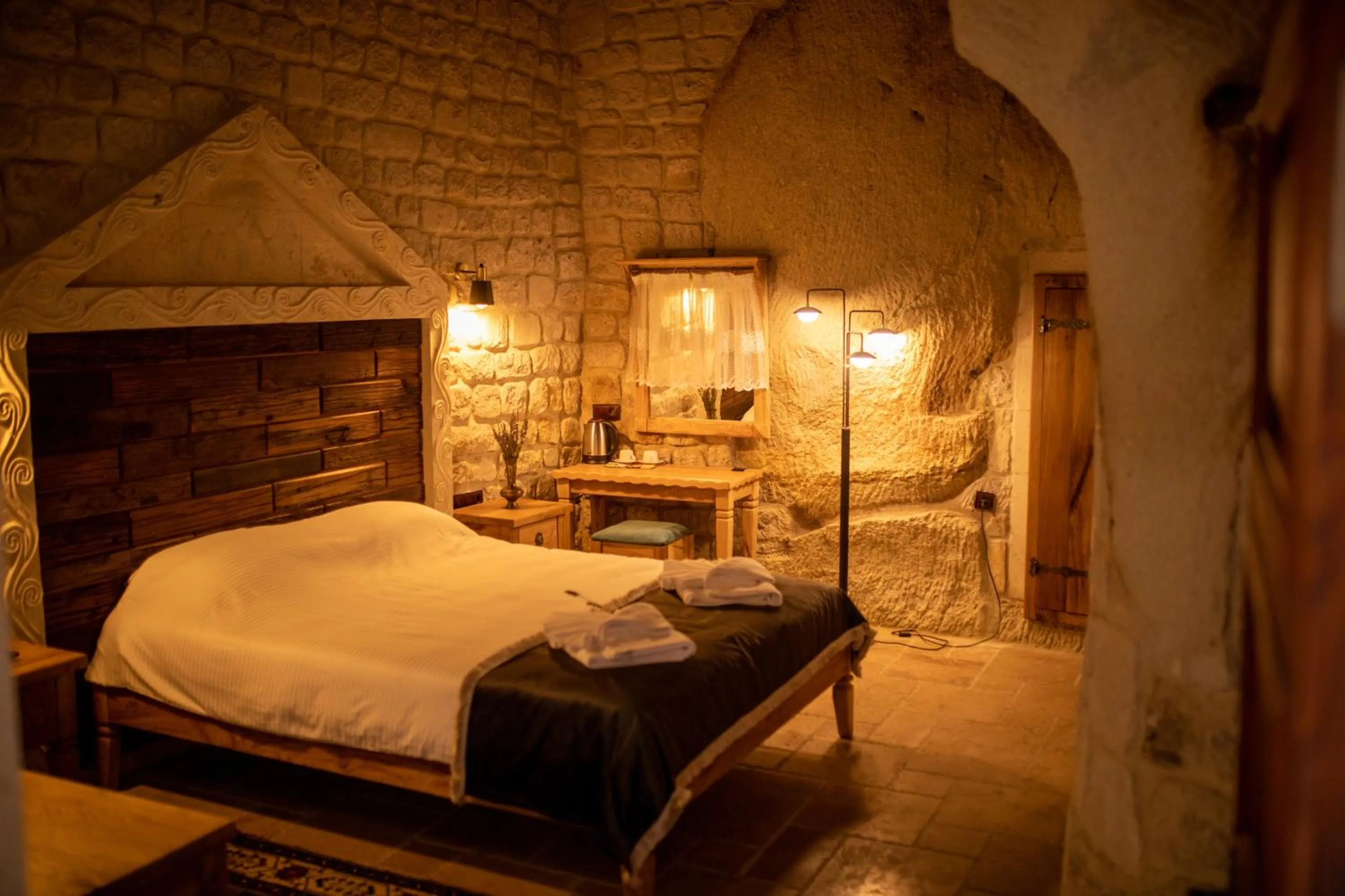 Bed in Pome Granate Cave Hotel