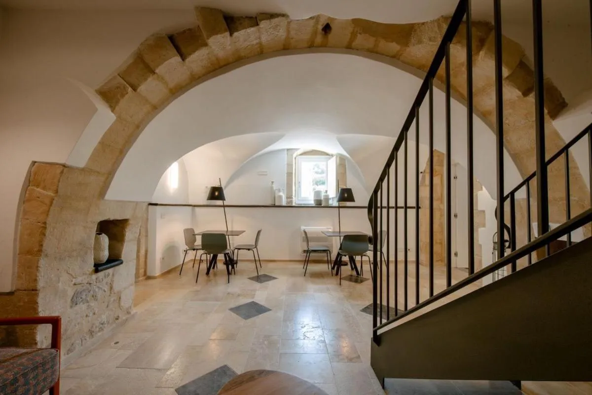 Communal lounge/ TV room in IBLA ROOMS