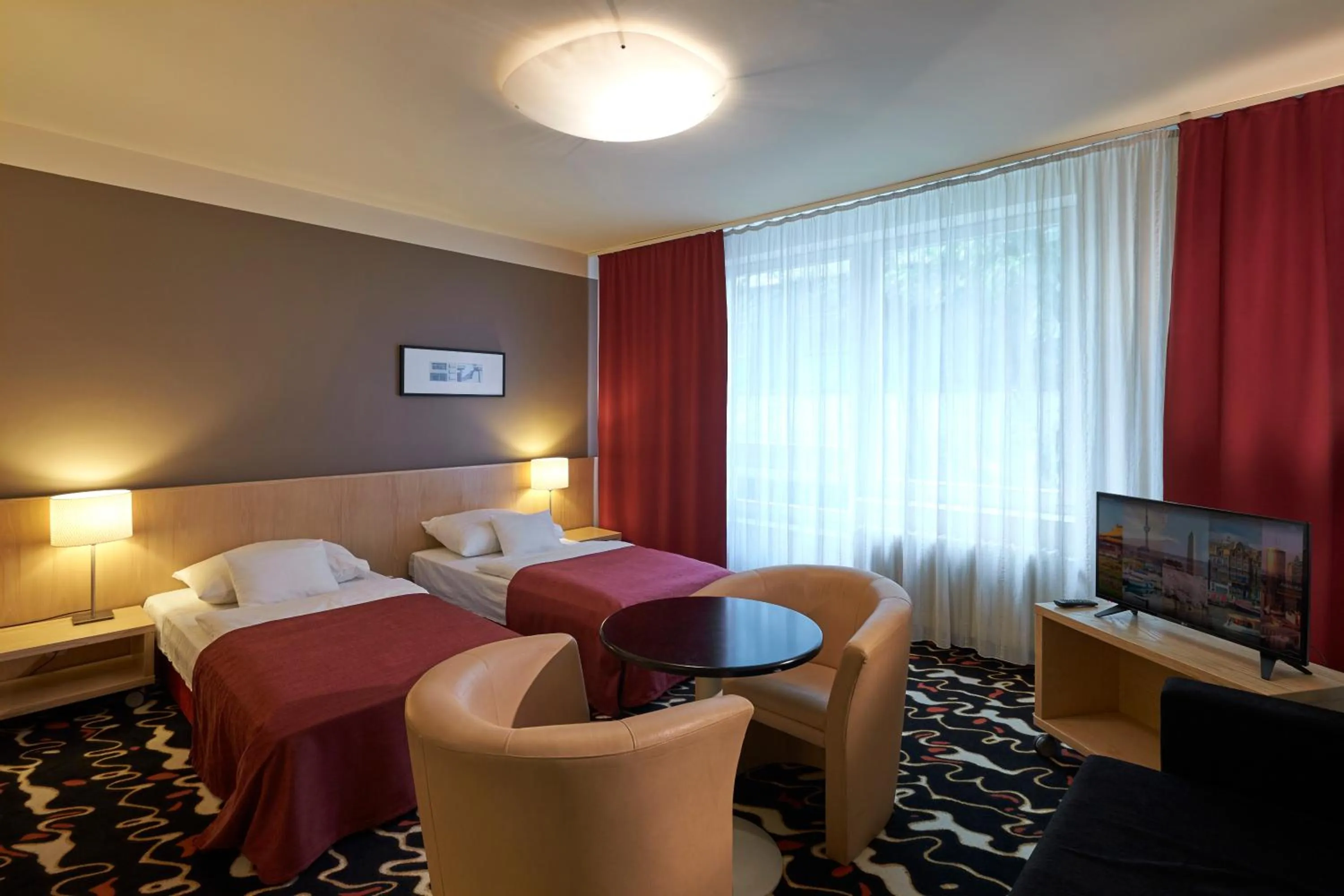 Bed in Hotel Laterum