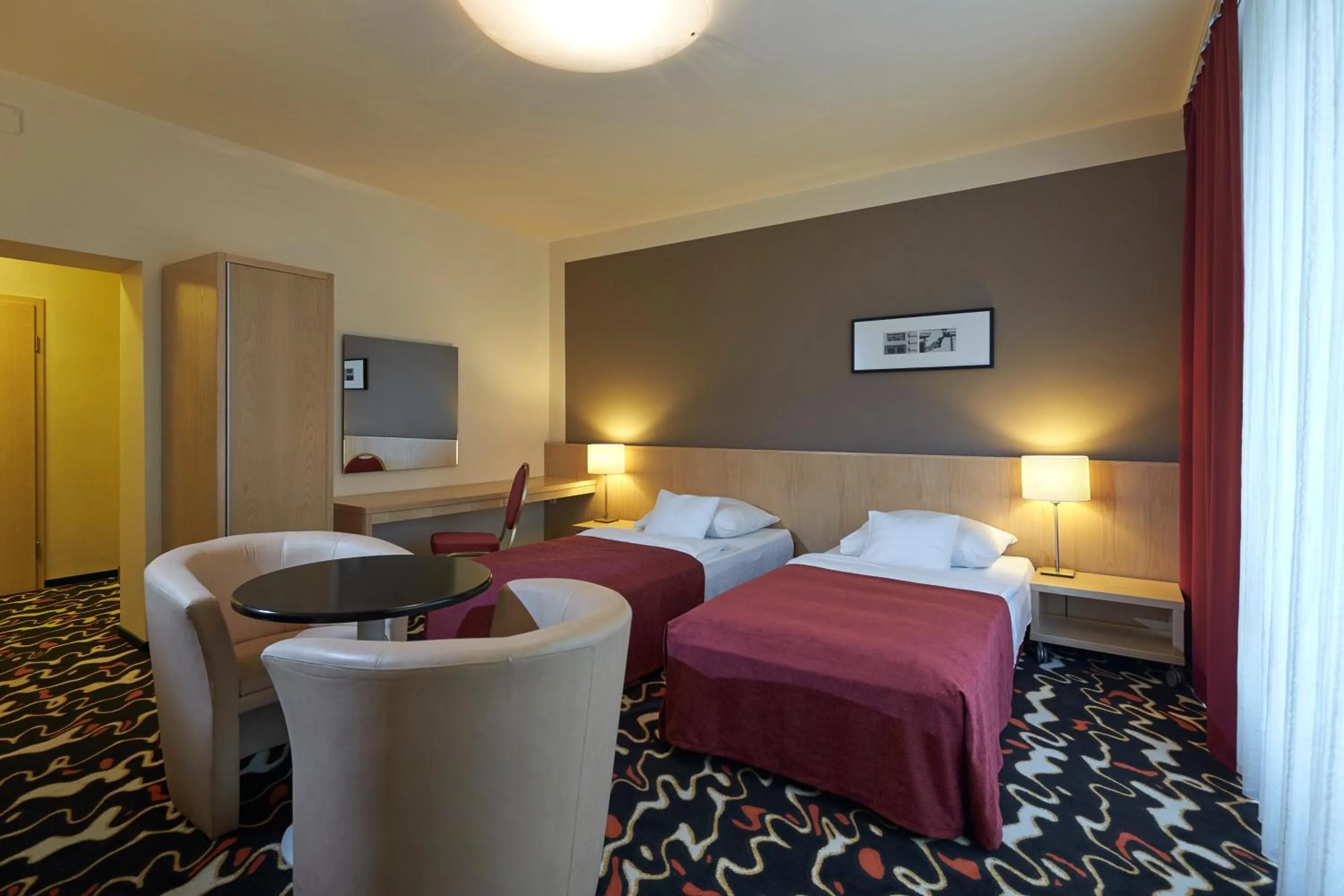 Bed in Hotel Laterum