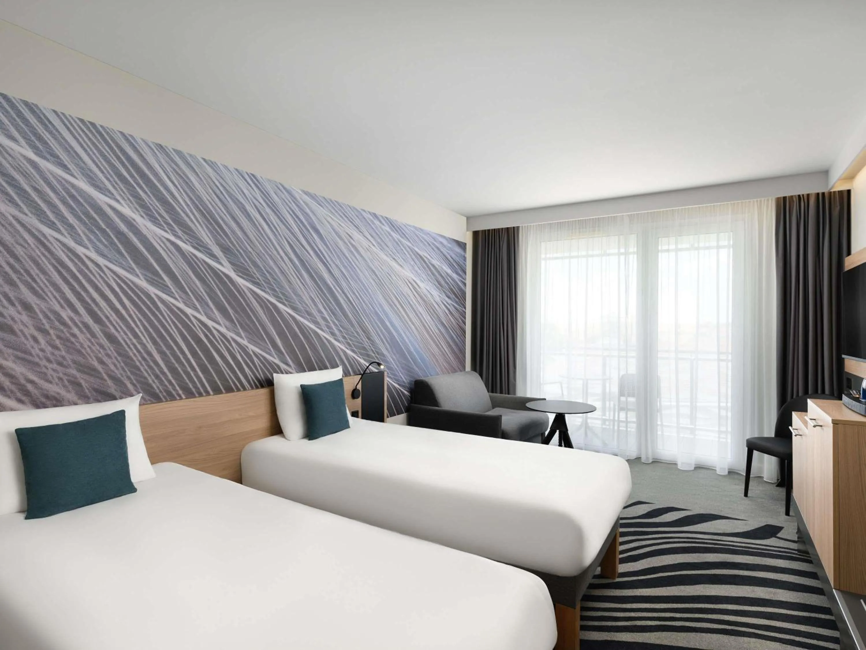 Seating area, Bed in Novotel Szeged