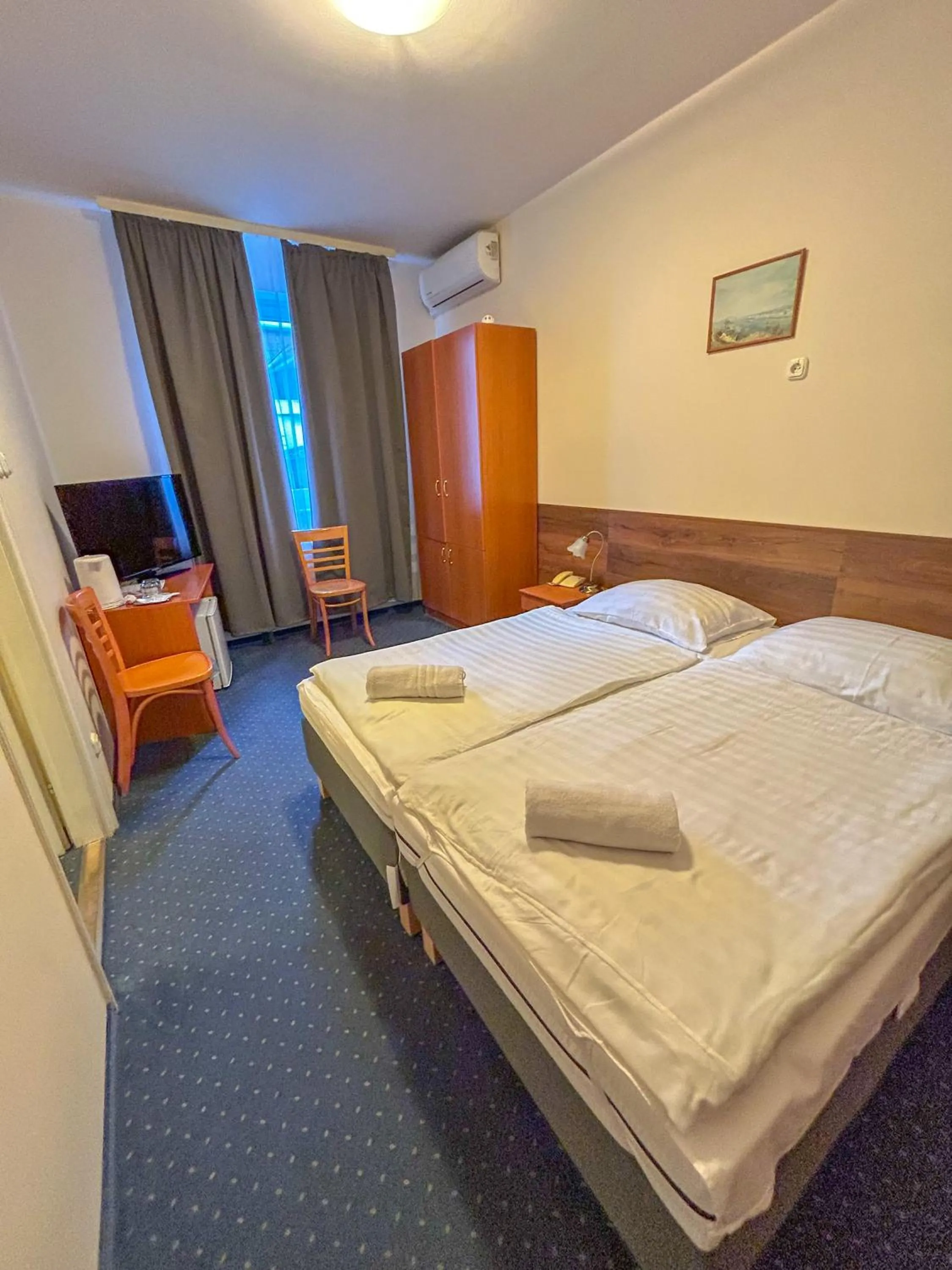 Photo of the whole room, Bed in Corvin Hotel