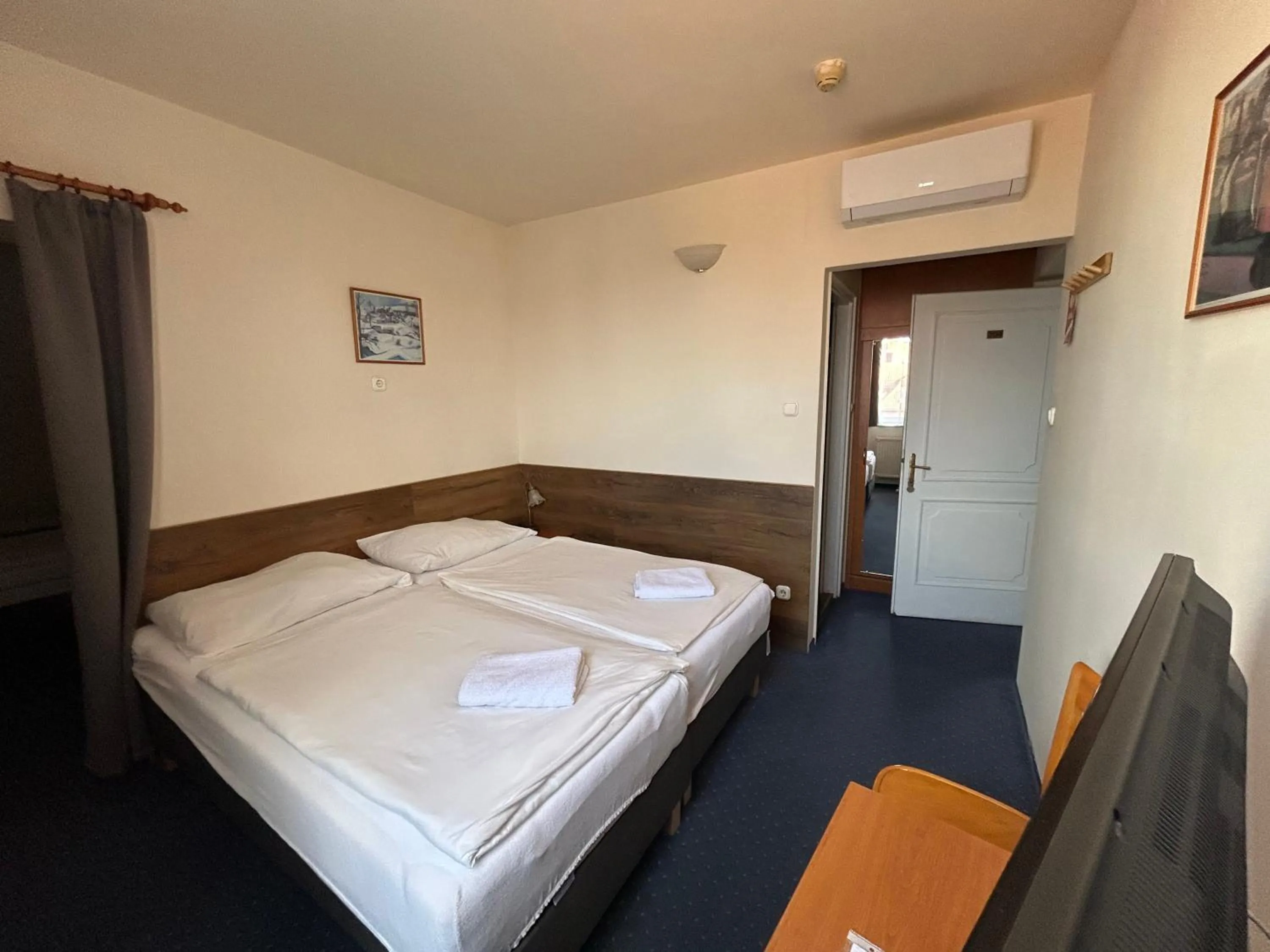 Photo of the whole room, Bed in Corvin Hotel