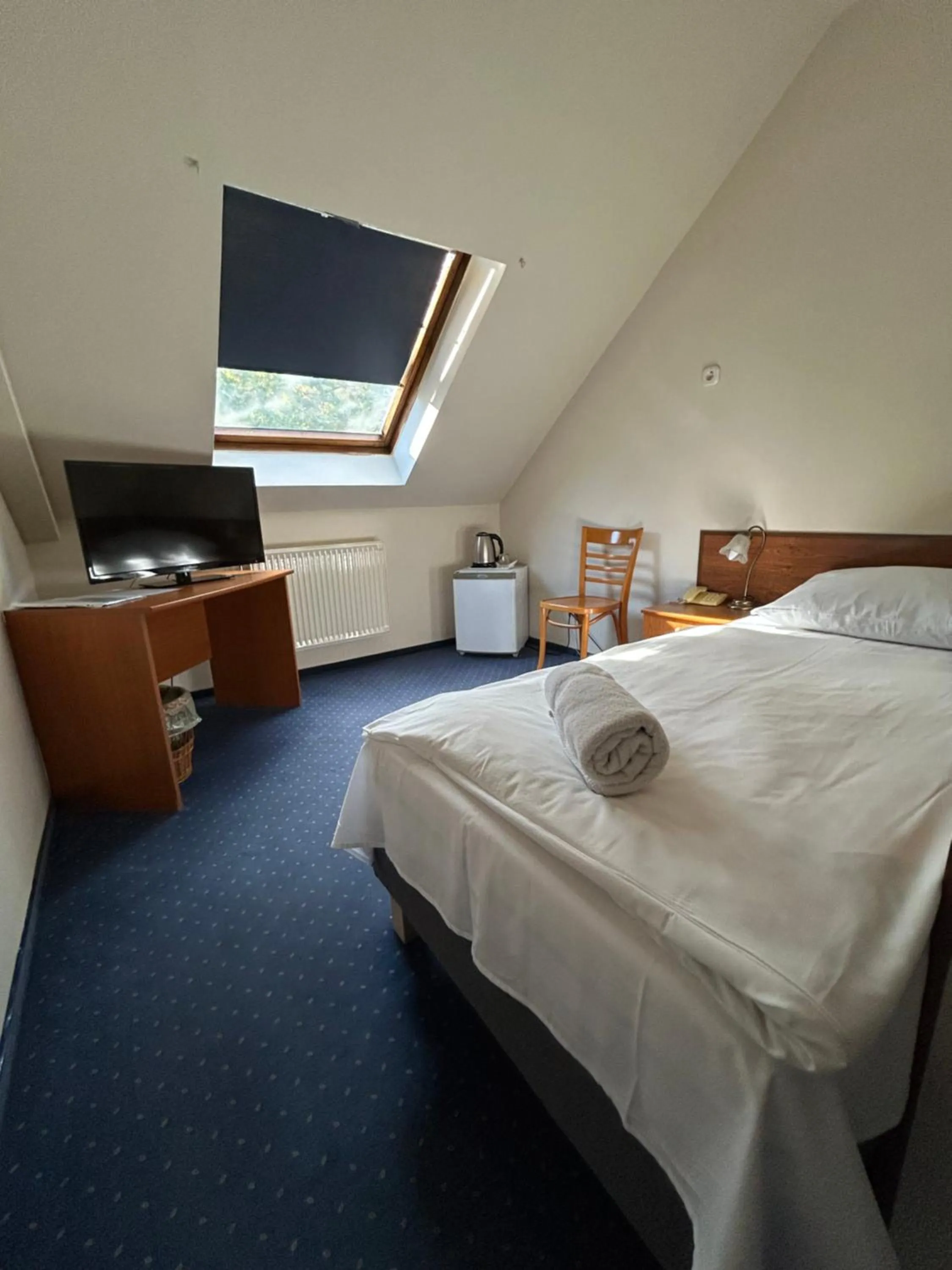 Photo of the whole room, Bed in Corvin Hotel