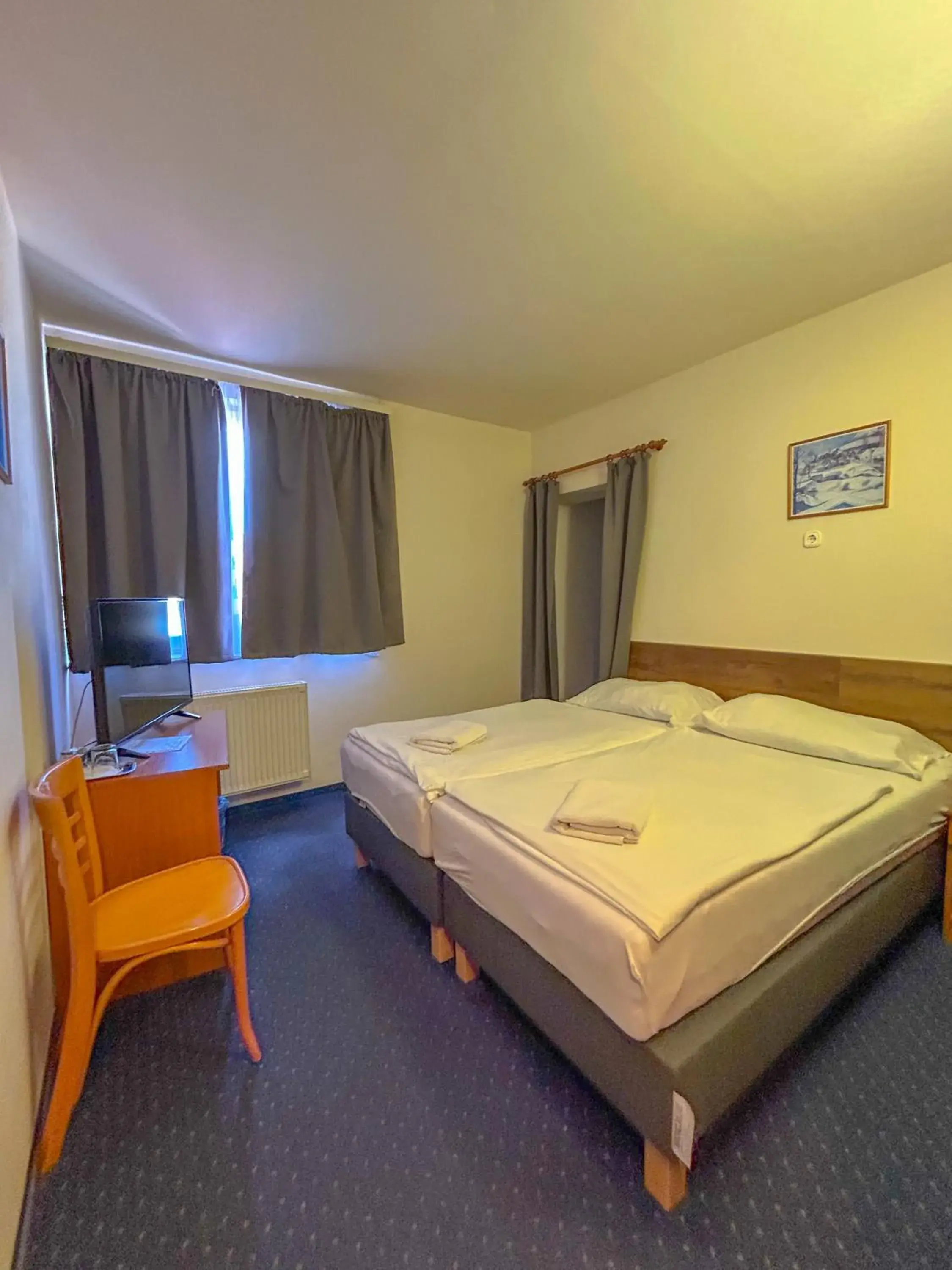 Family Room (2 Adults + 1 Child) in Corvin Hotel Family Room (2 Adults + 1 Child) in Corvin Hotel