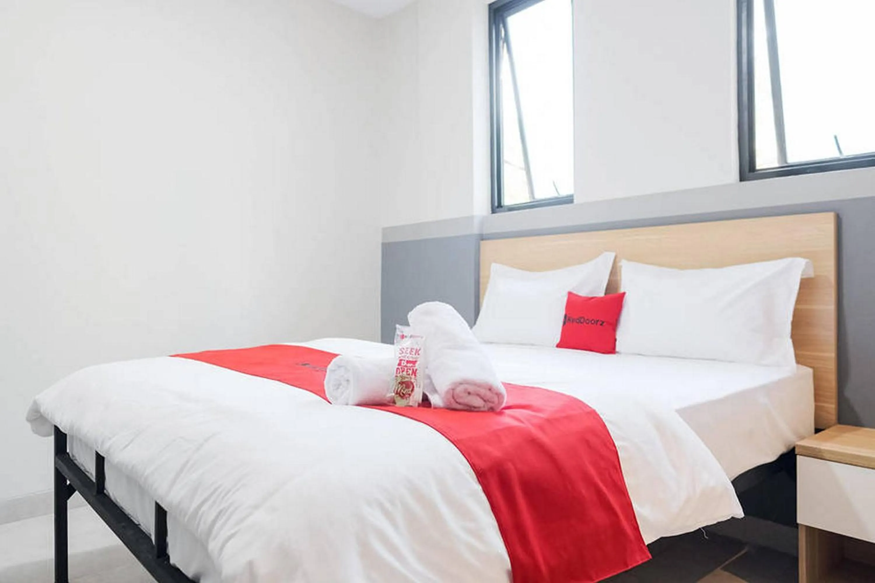Bed in RedDoorz Plus near Taman Anggrek Mall