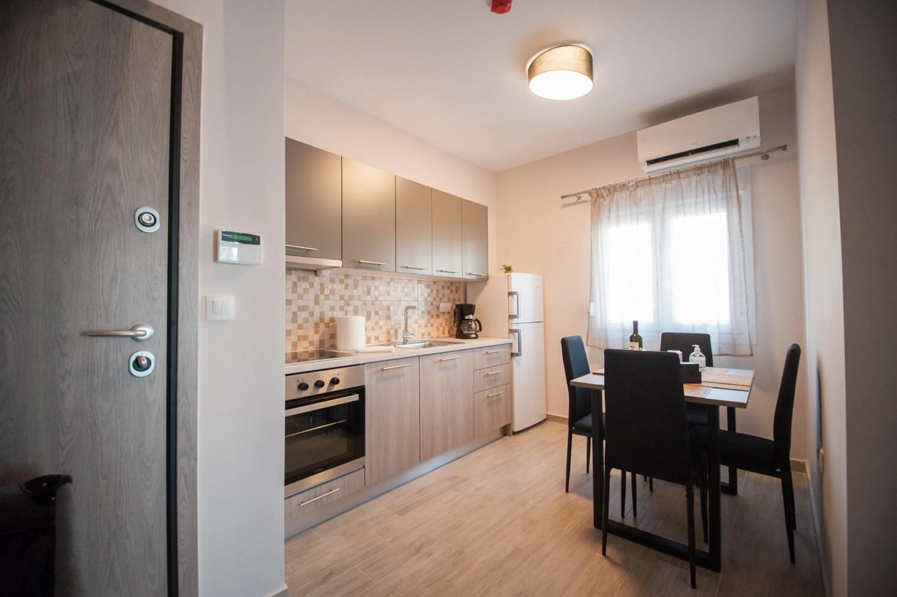 Kitchen or kitchenette in NIKI'S apartments