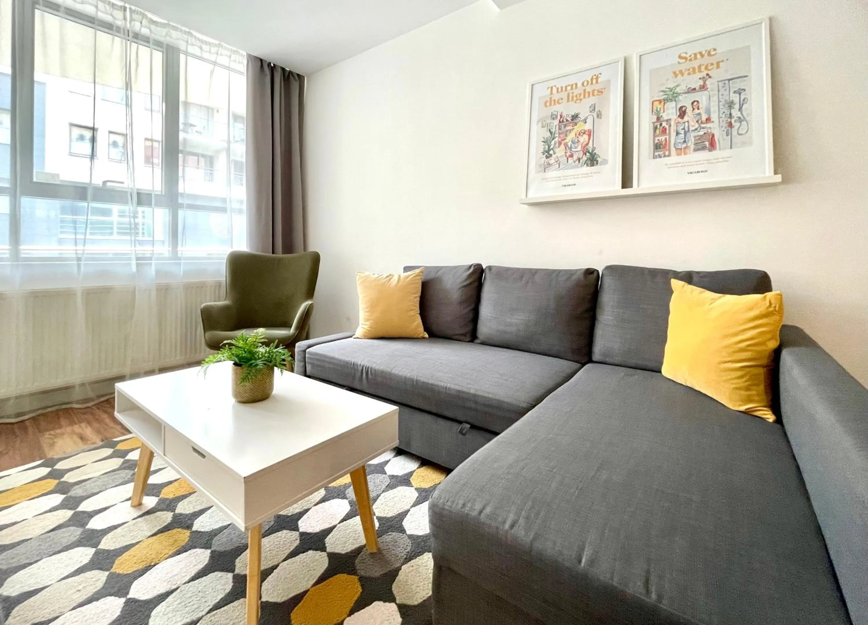 Living room in Central Passage Apartments by Vagabond Downtown