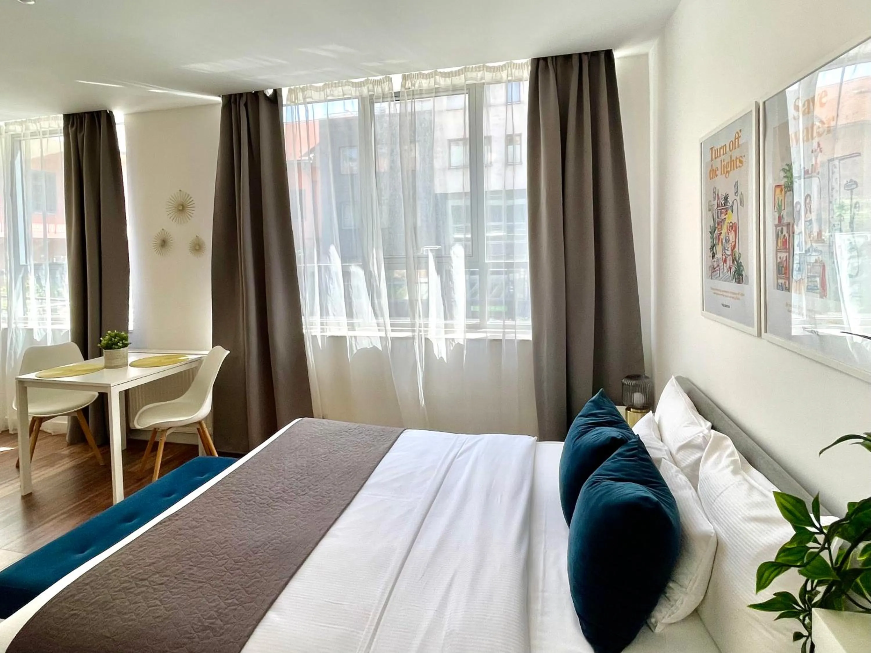 Photo of the whole room, Bed in Central Passage Apartments by Vagabond Downtown