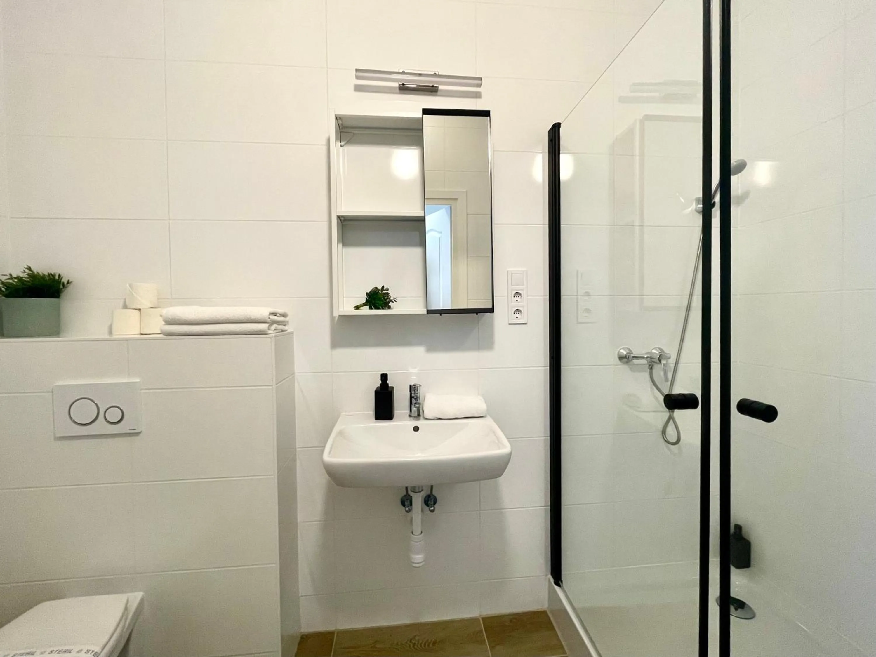 Bathroom in Central Passage Apartments by Vagabond Downtown