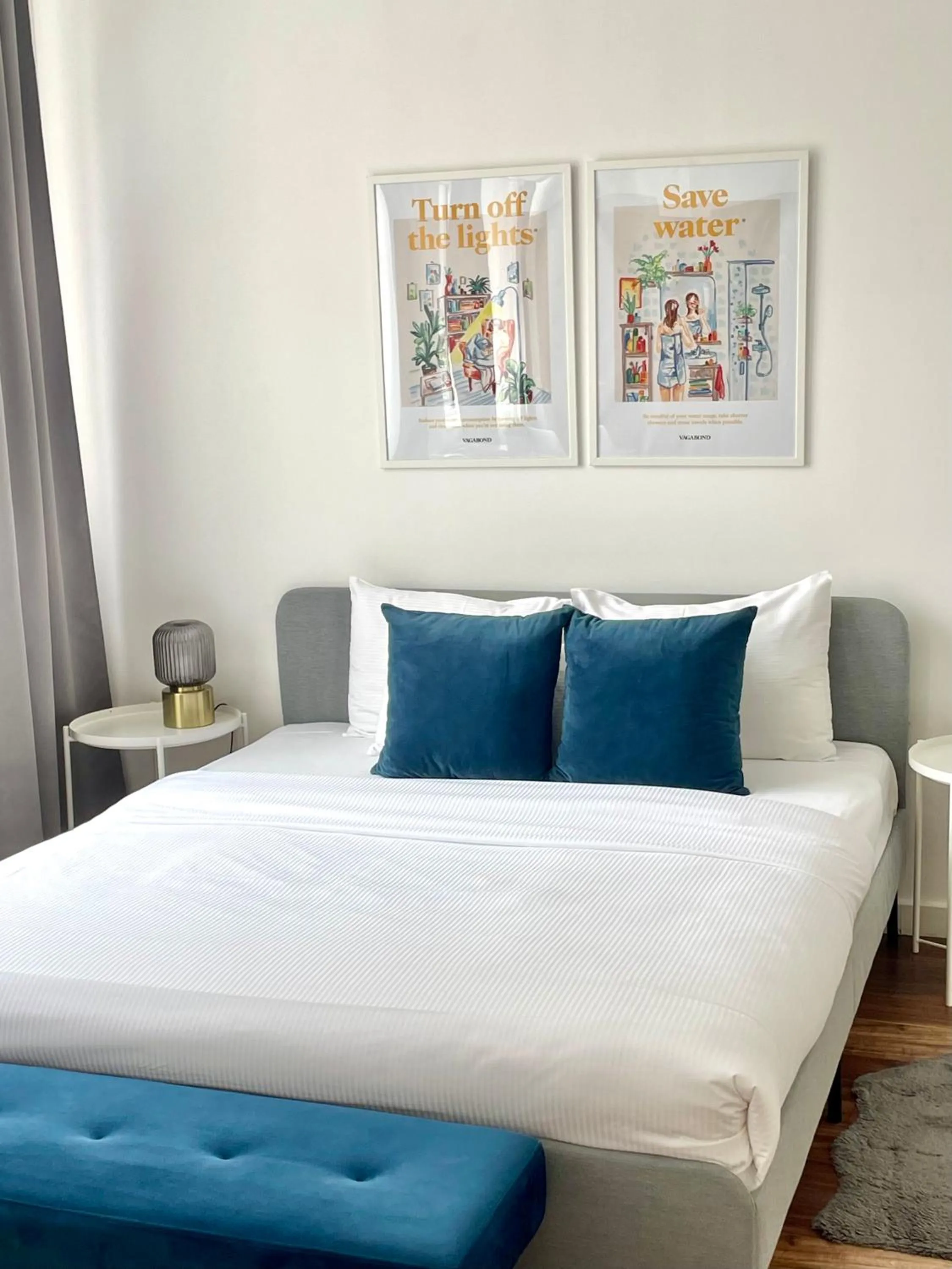 Bed in Central Passage Apartments by Vagabond Downtown