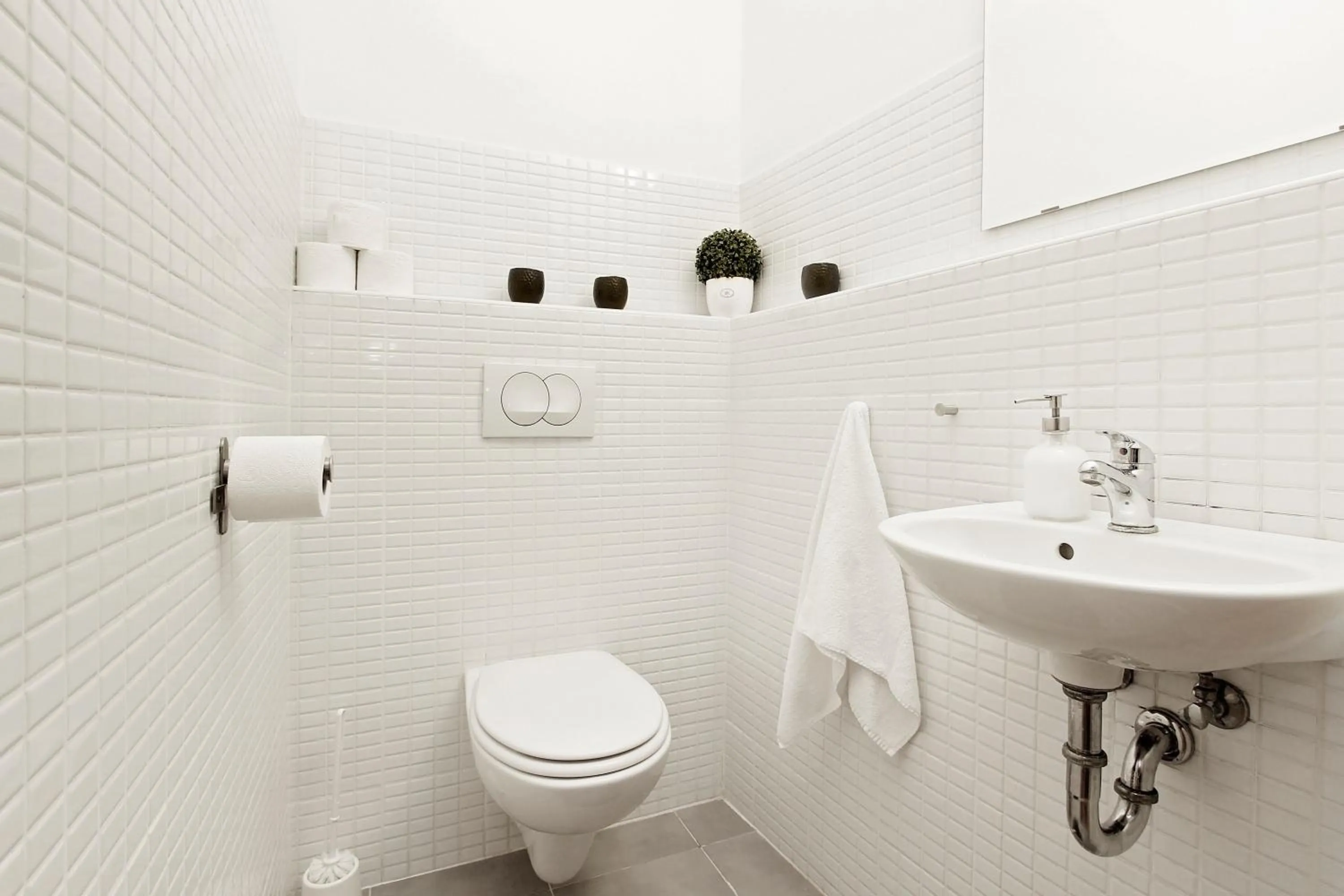 Bathroom in Central Passage Apartments by Vagabond Downtown