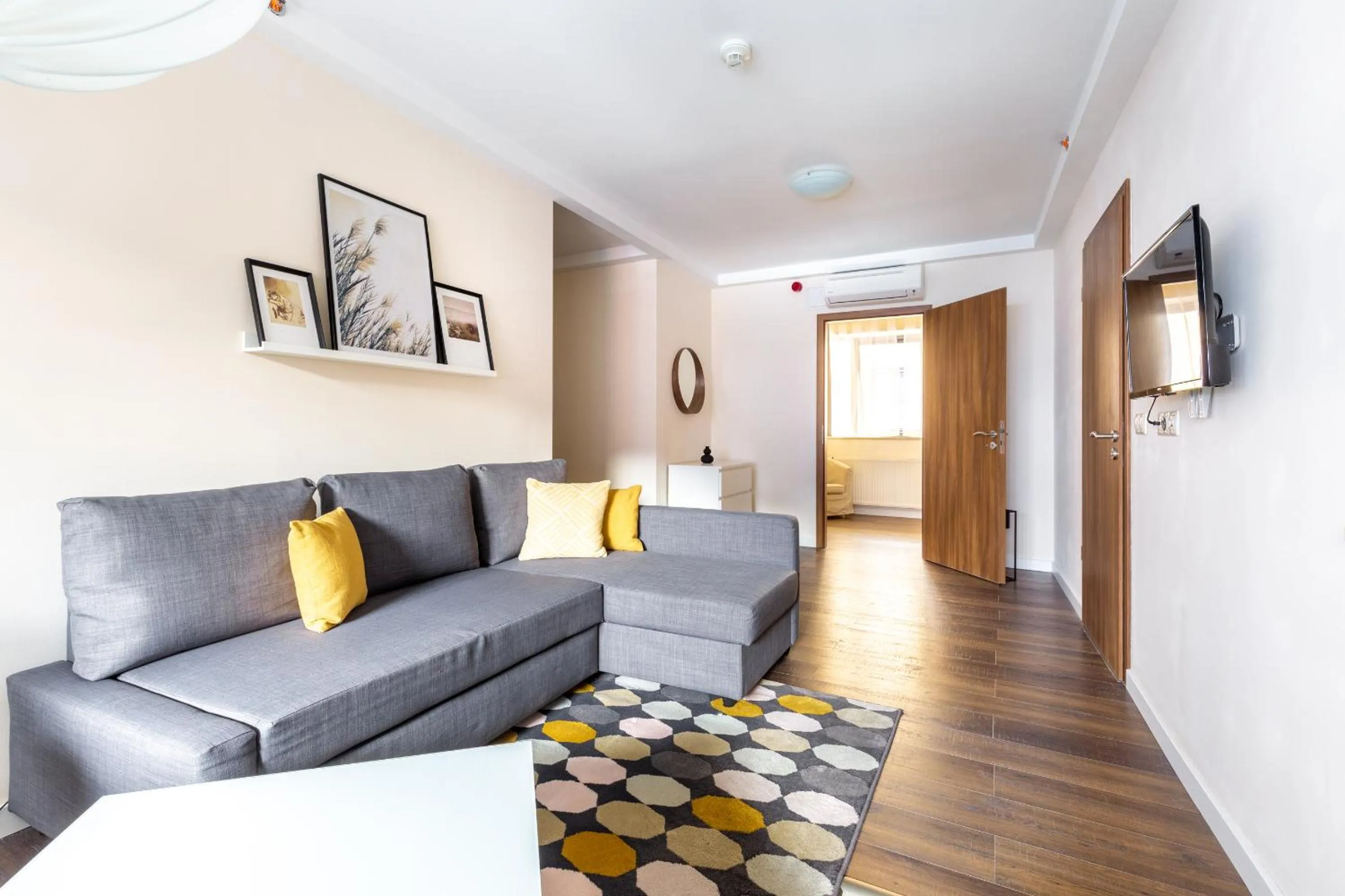 Living room in Central Passage Apartments by Vagabond Downtown