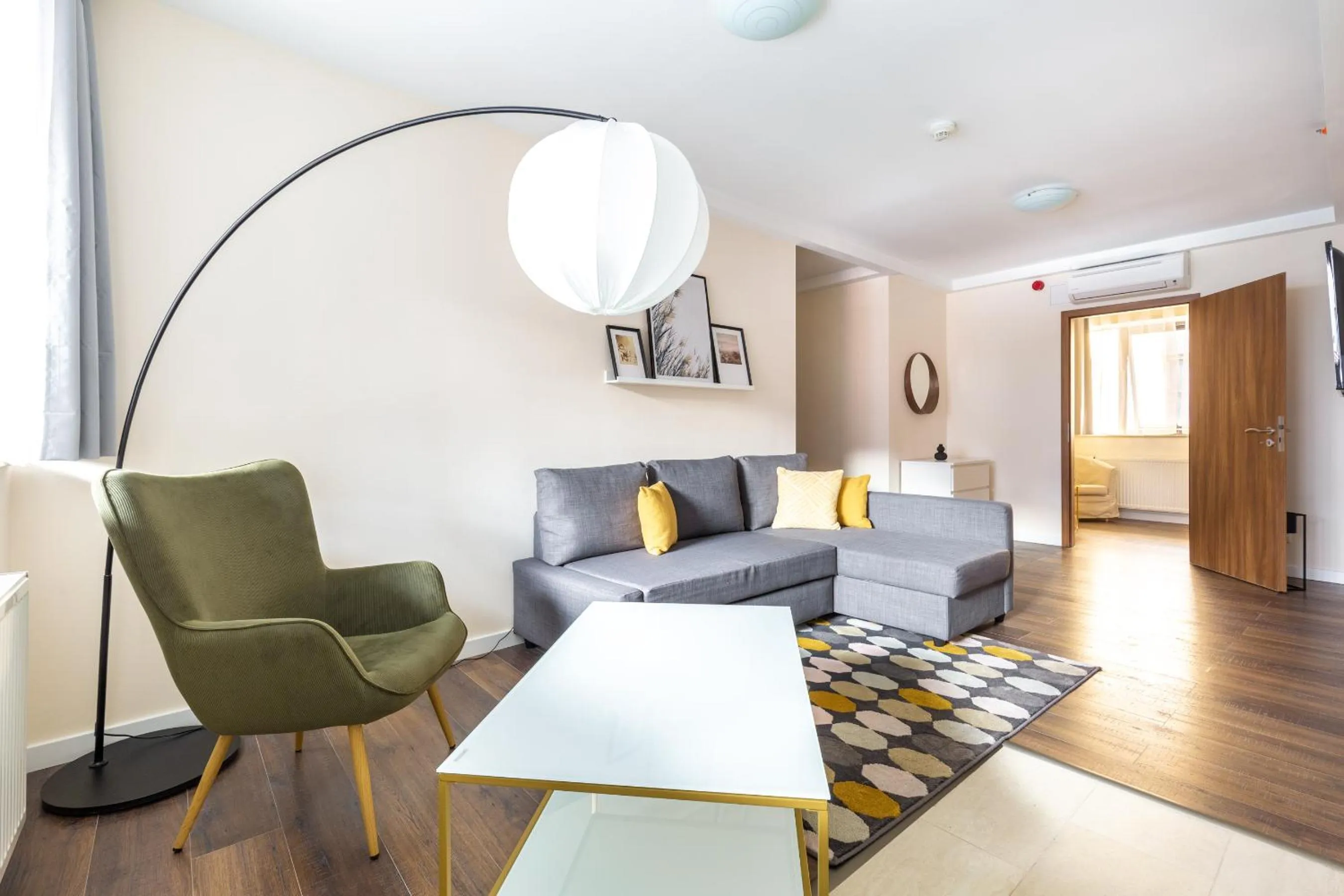 Living room in Central Passage Apartments by Vagabond Downtown