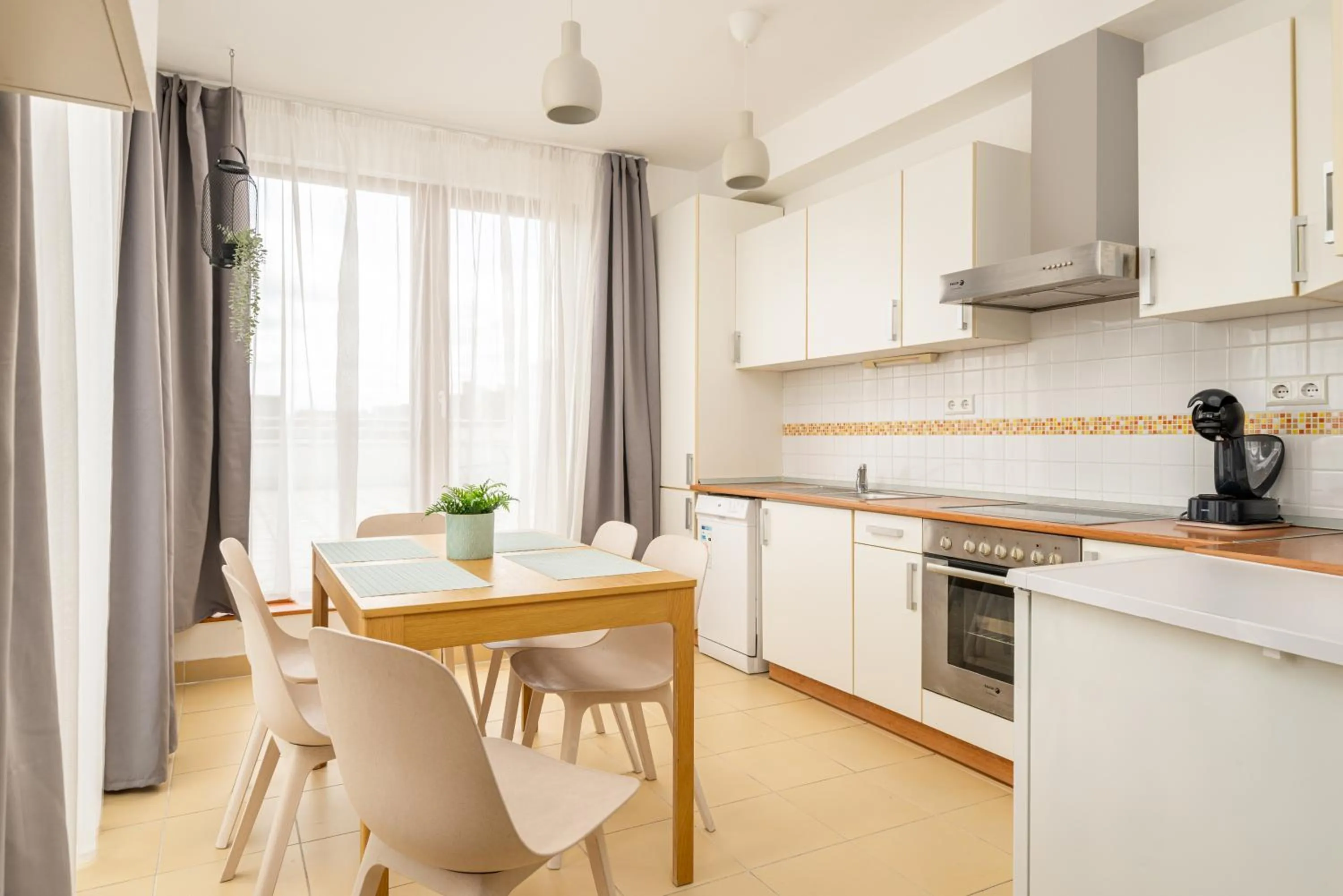 Kitchen or kitchenette in Central Passage Apartments by Vagabond Downtown