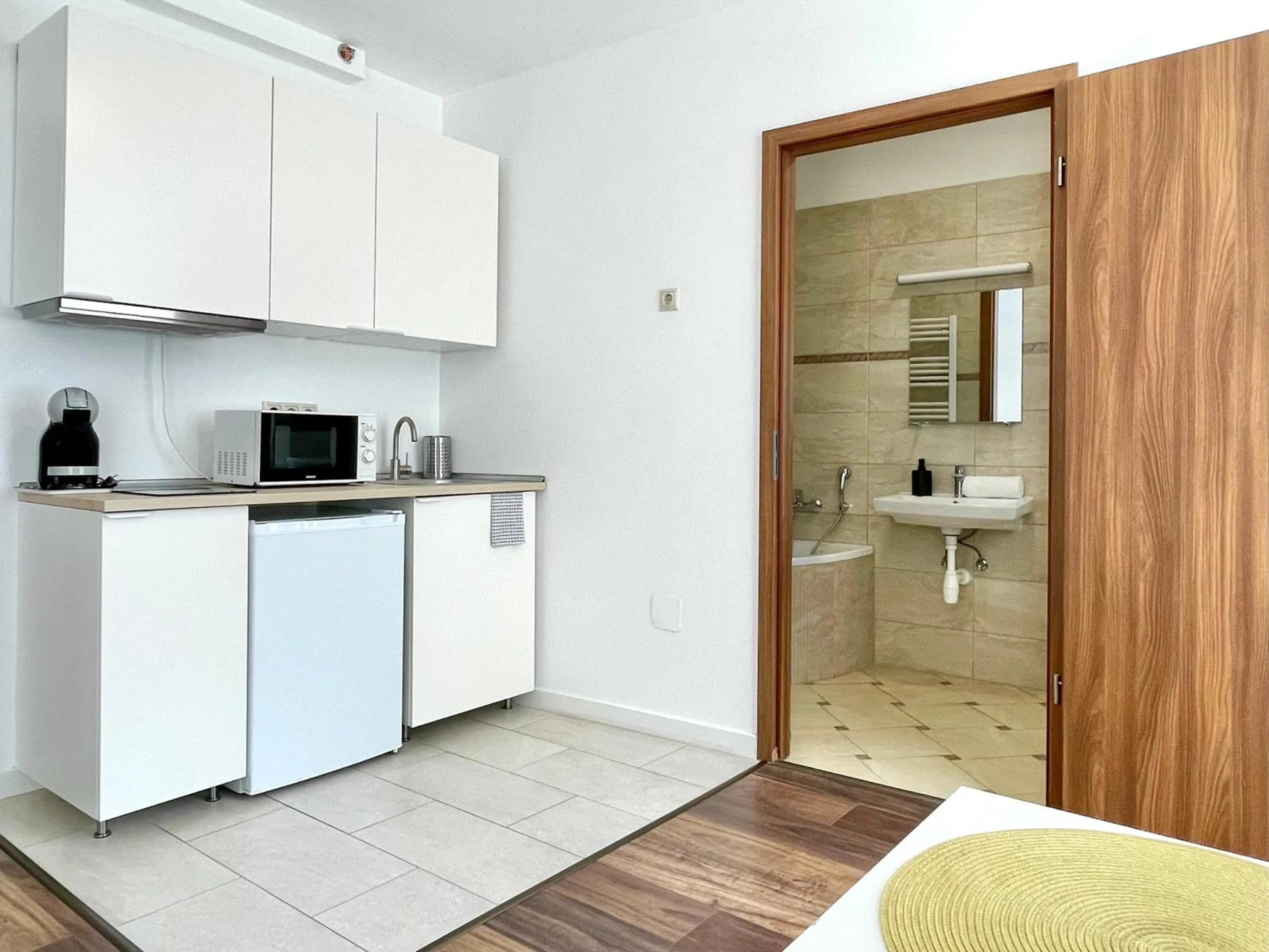 kitchen in Central Passage Apartments by Vagabond Downtown