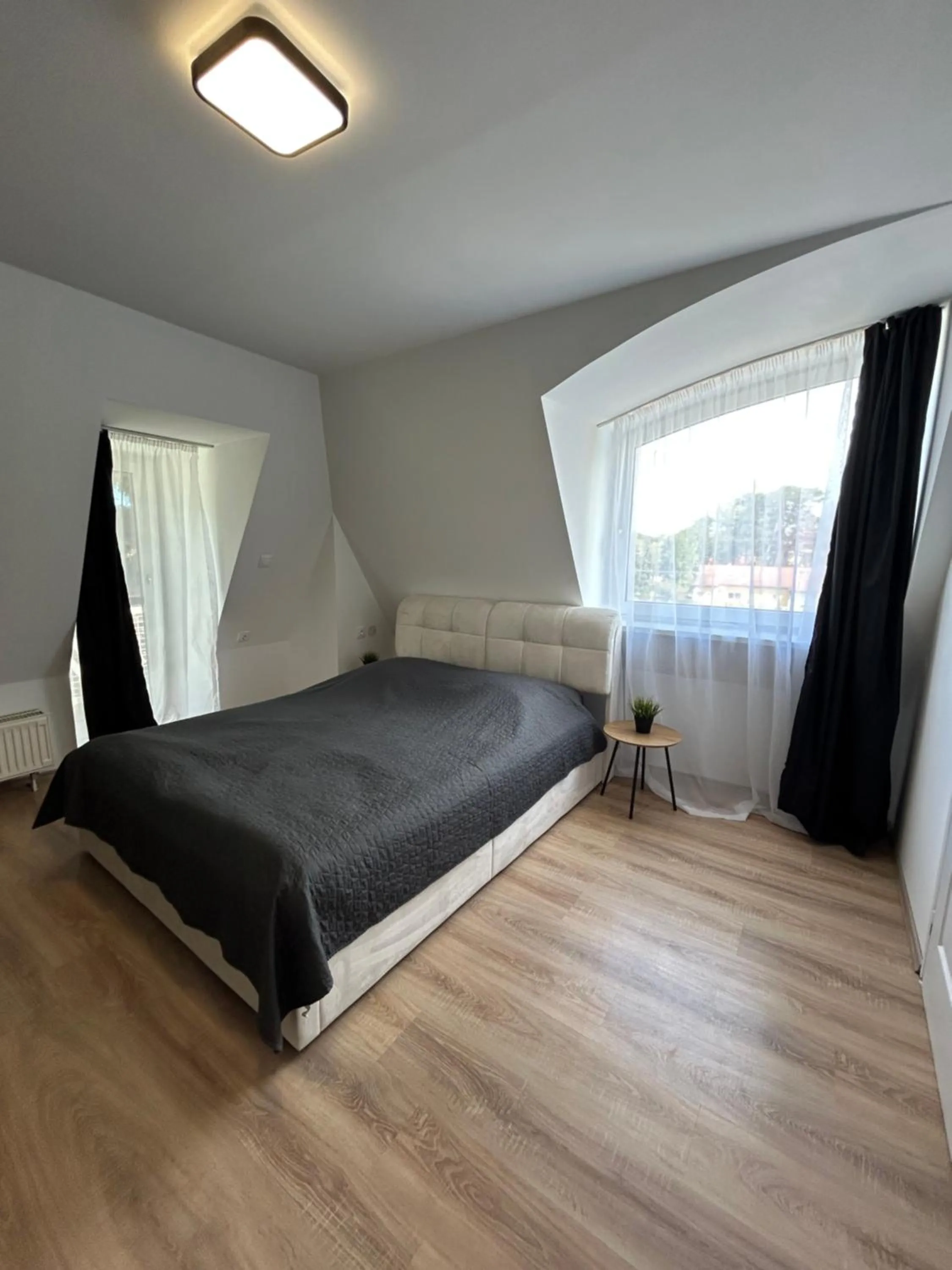 Bed in Caesar Apartments & Rooms
