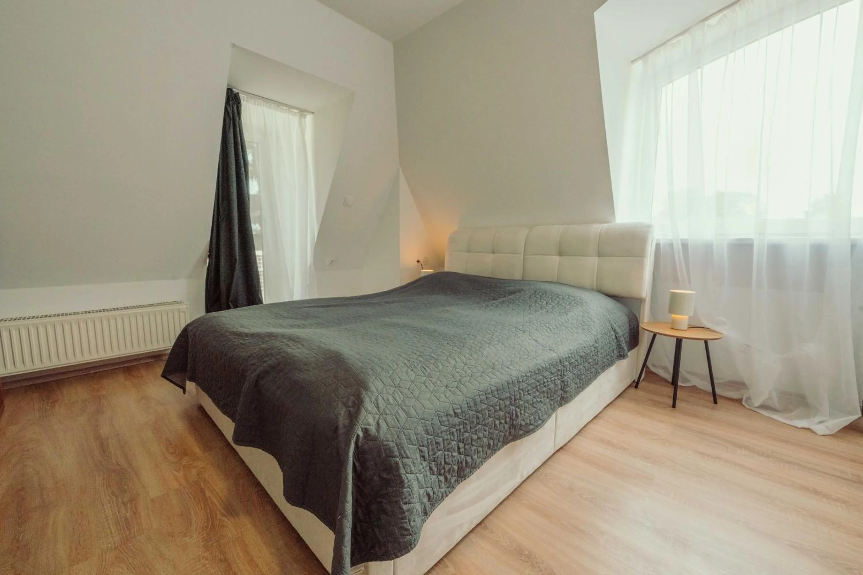 Bed in Caesar Apartments & Rooms