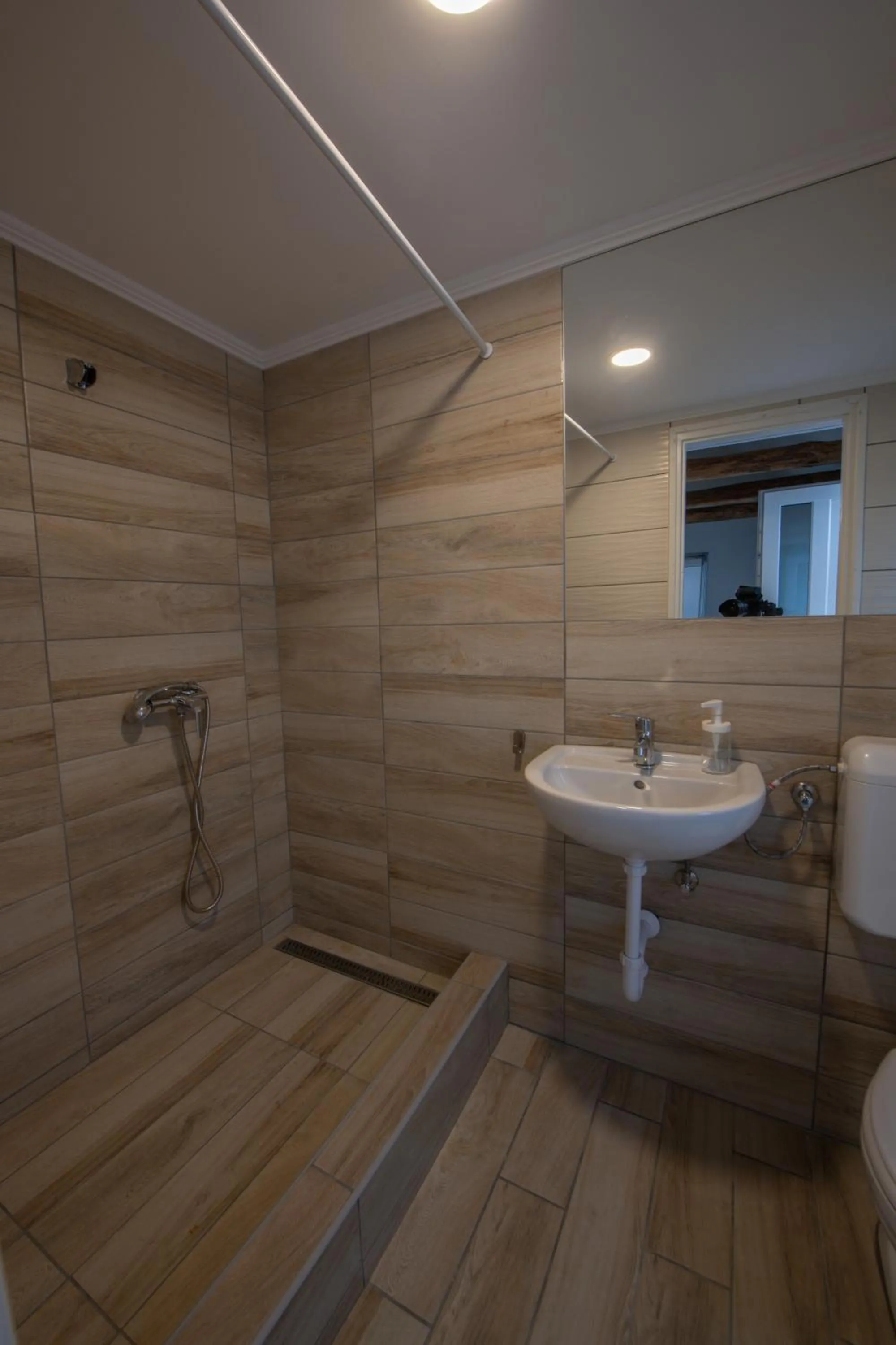 Bathroom in Caesar Apartments & Rooms