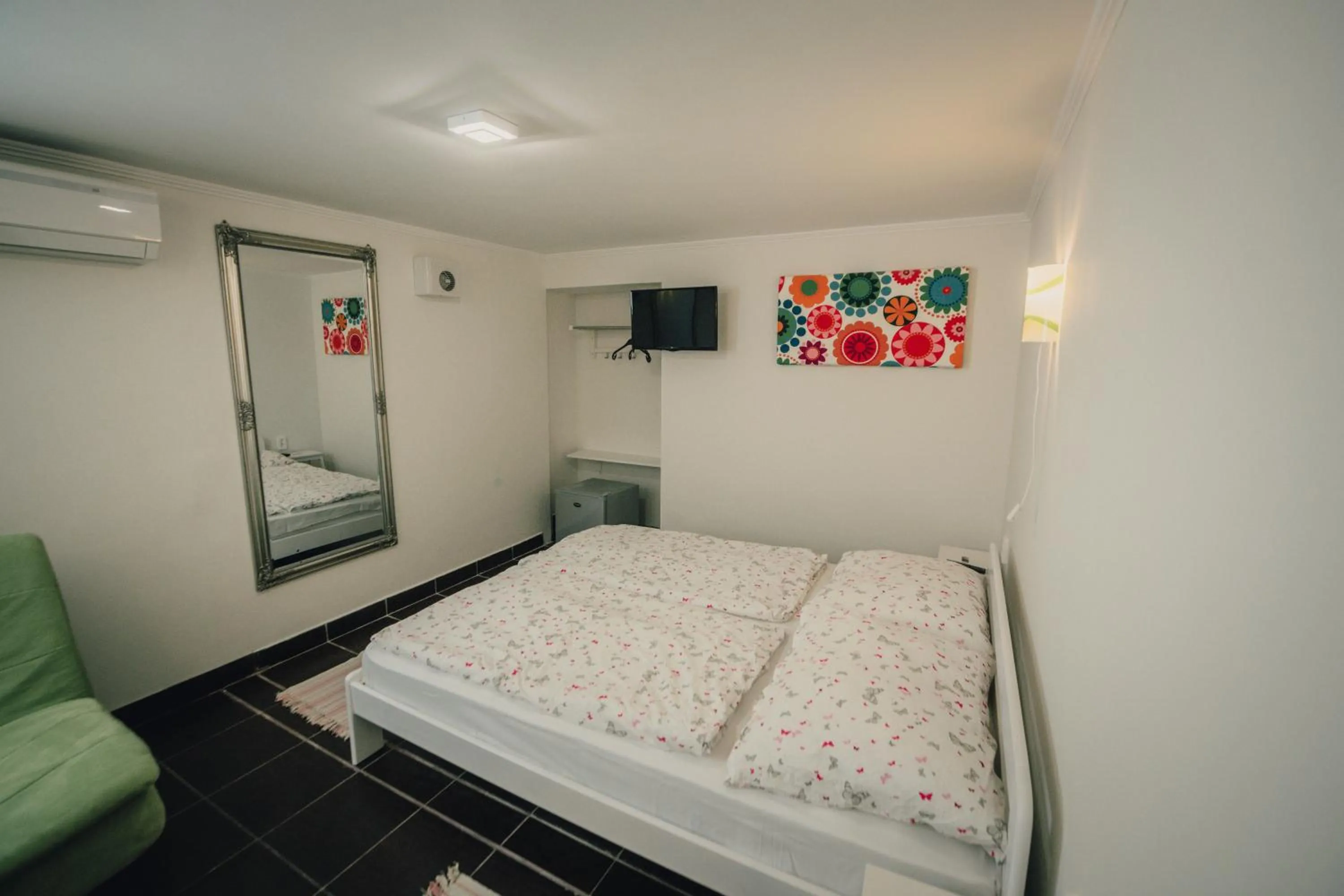 Bedroom, Bed in Caesar Apartments & Rooms