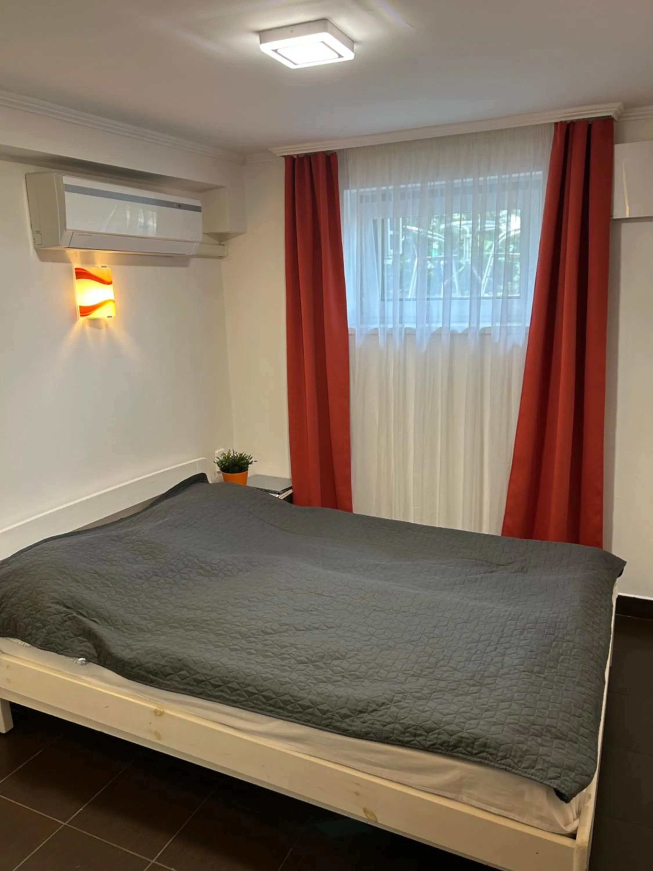 Bed in Caesar Apartments & Rooms