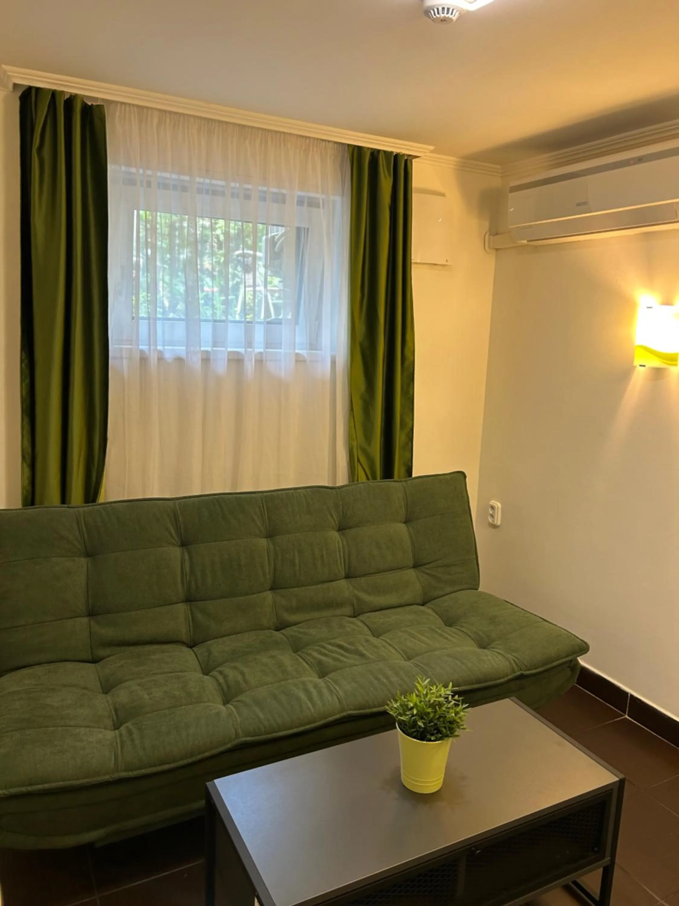 Seating area in Caesar Apartments & Rooms