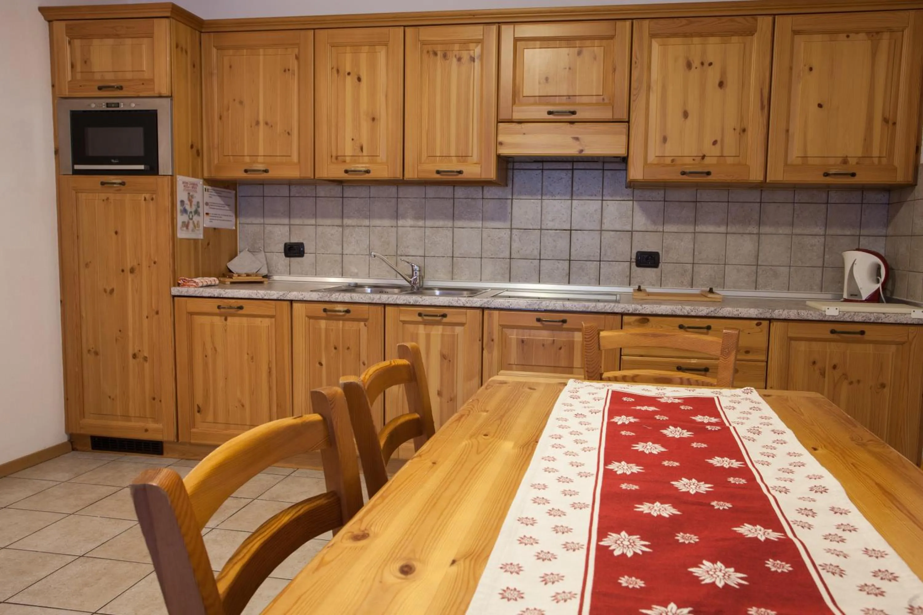 Kitchen or kitchenette in lareit appartamenti