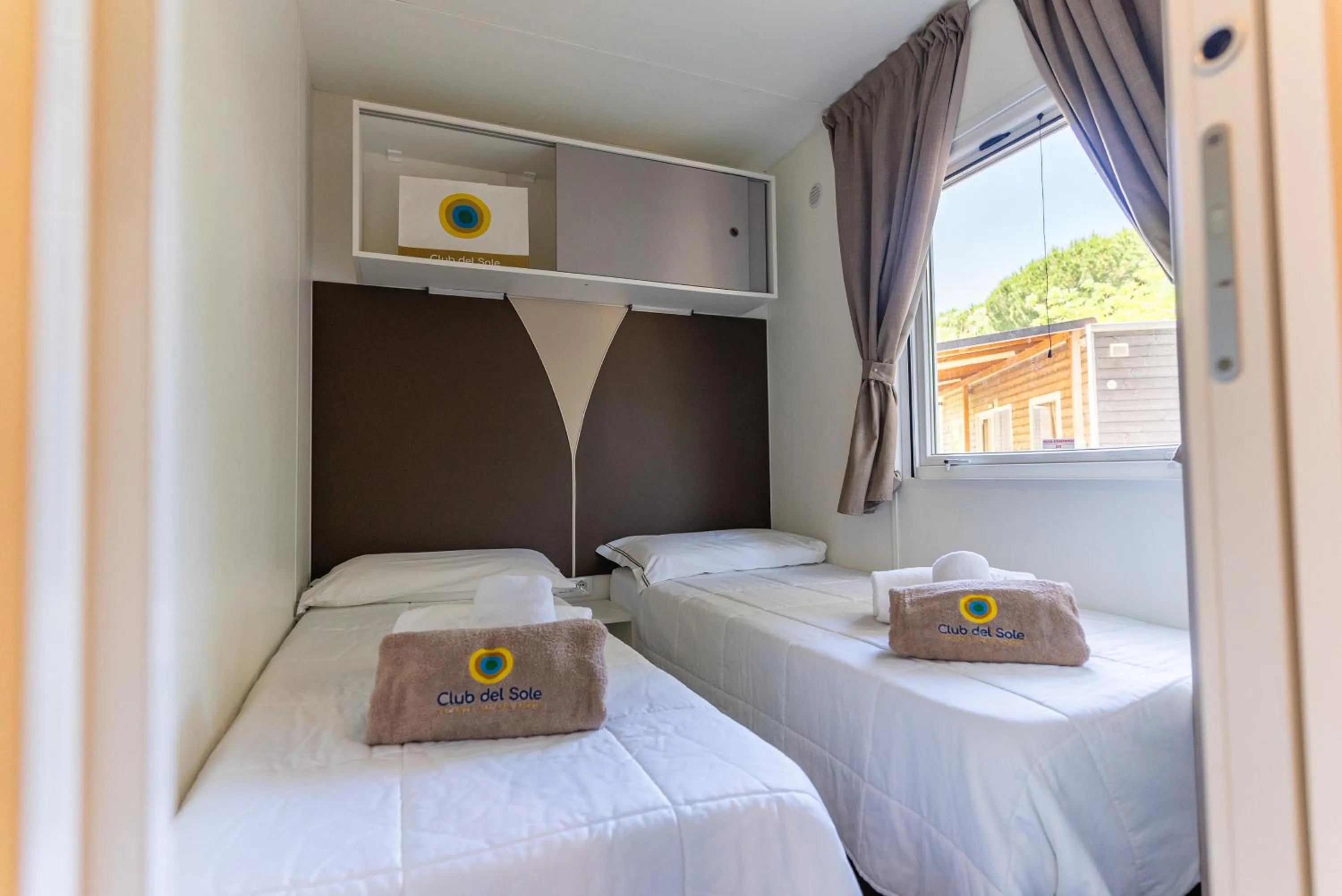 Bedroom, Bed in Club del Sole Orbetello Family Collection